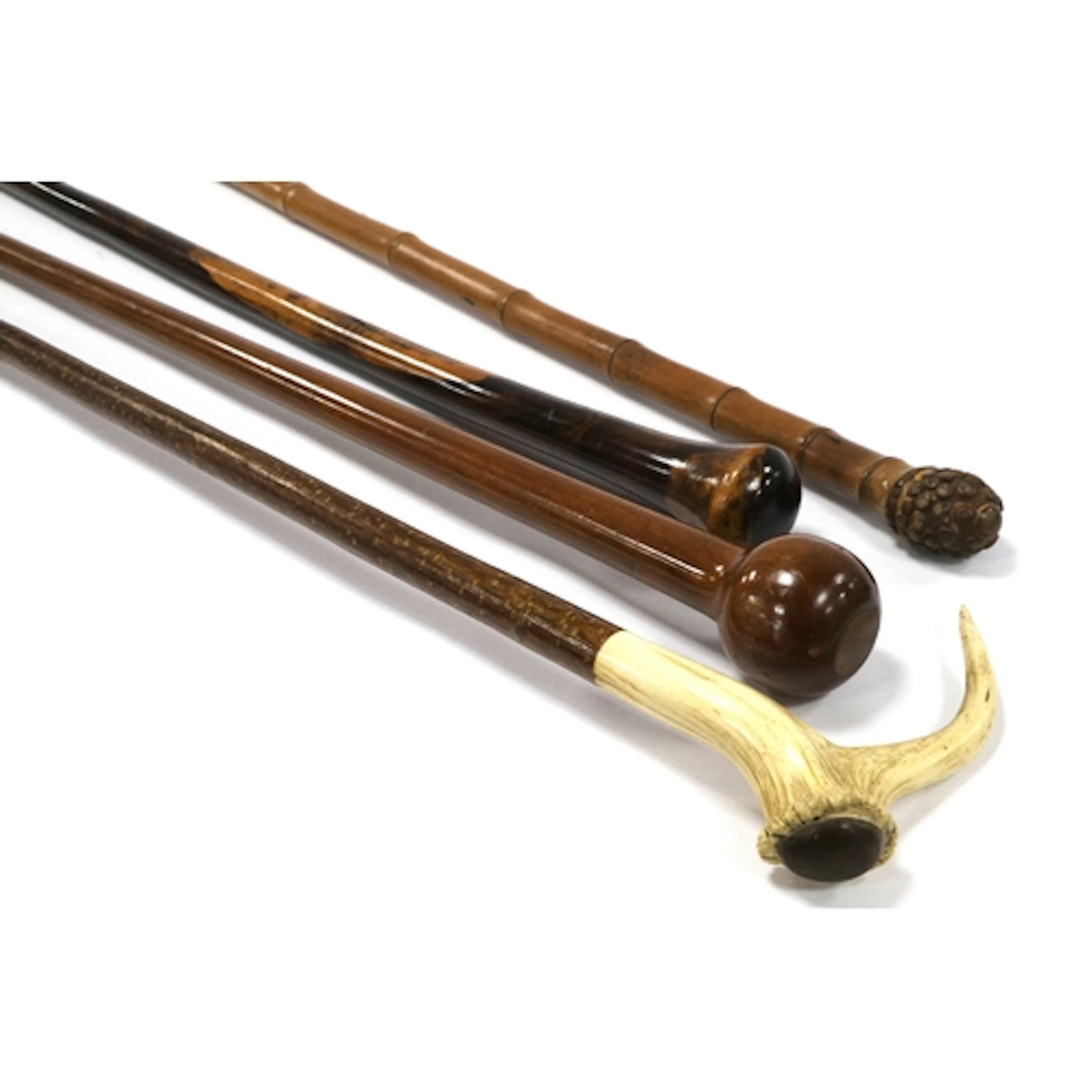 A Walking Stick, with an antler handle, 122cm long, a walkin...
