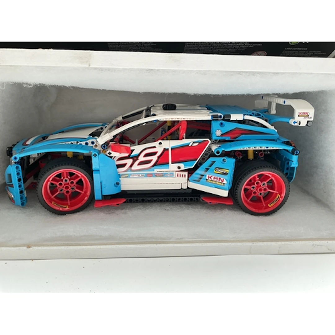 A Lego Technic Rally Car In Display Case With Box And Manual...