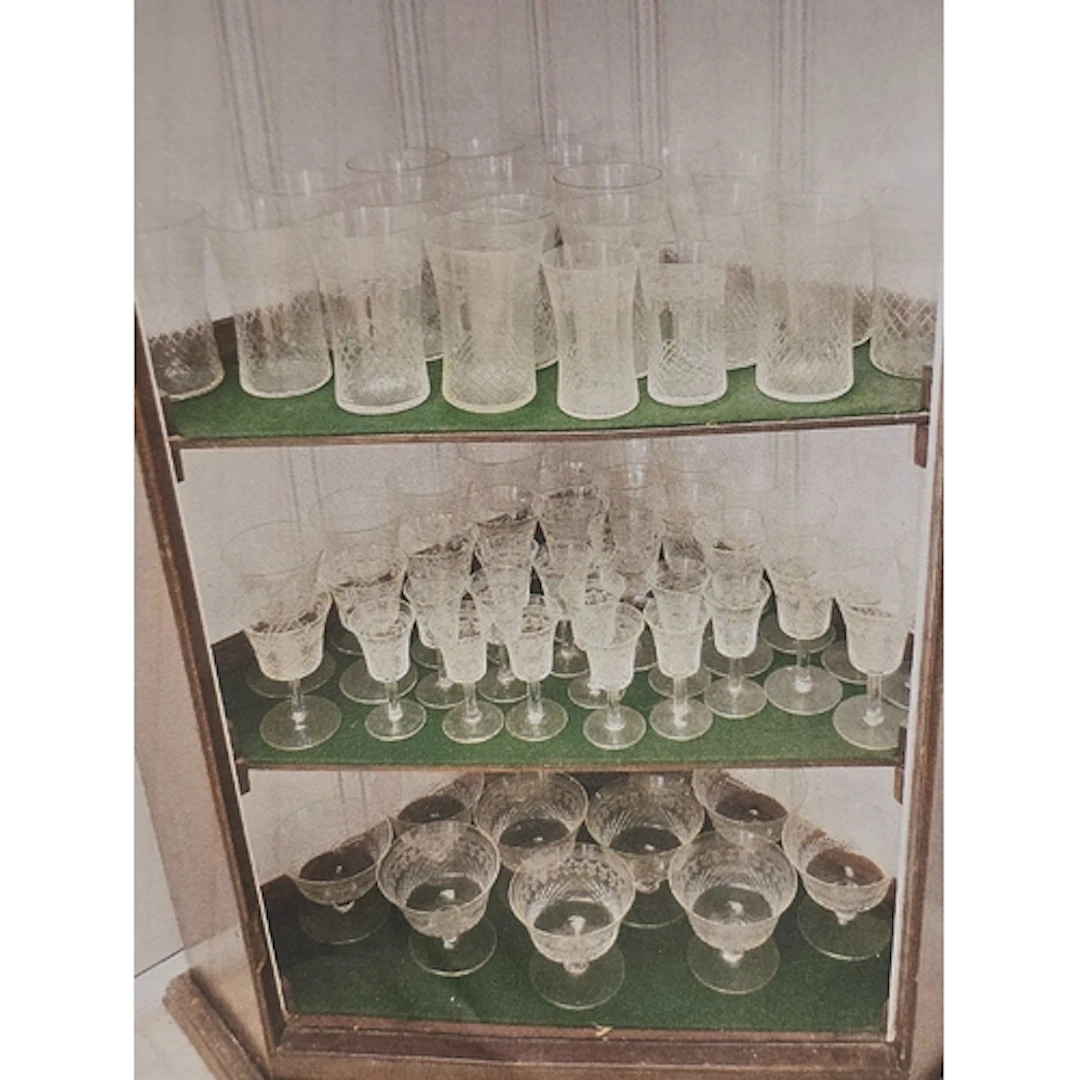 A large collection of vintage etched and blown clear drinkin...