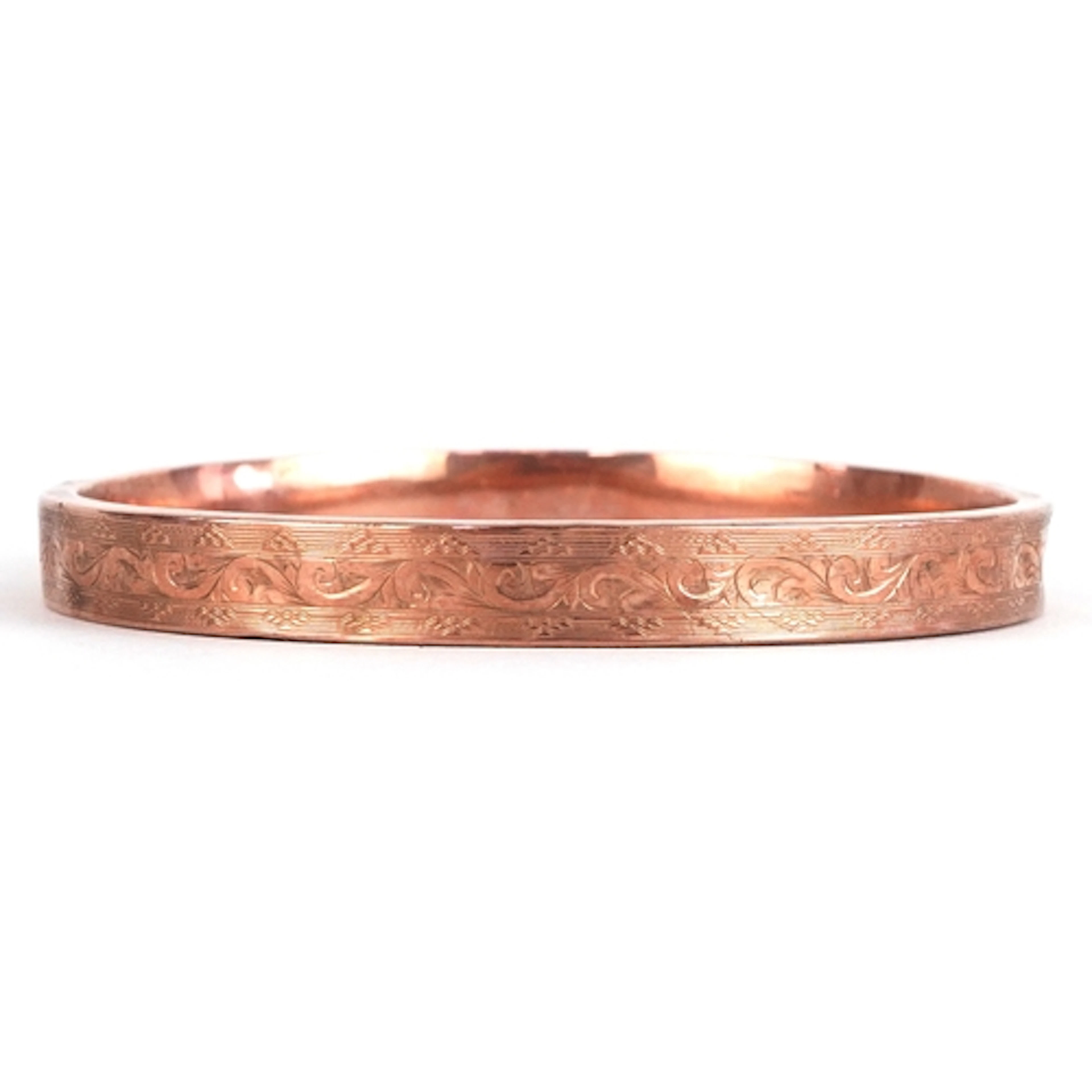 Victorian 9ct rose gold bangle with engraved decoration, 8.5...