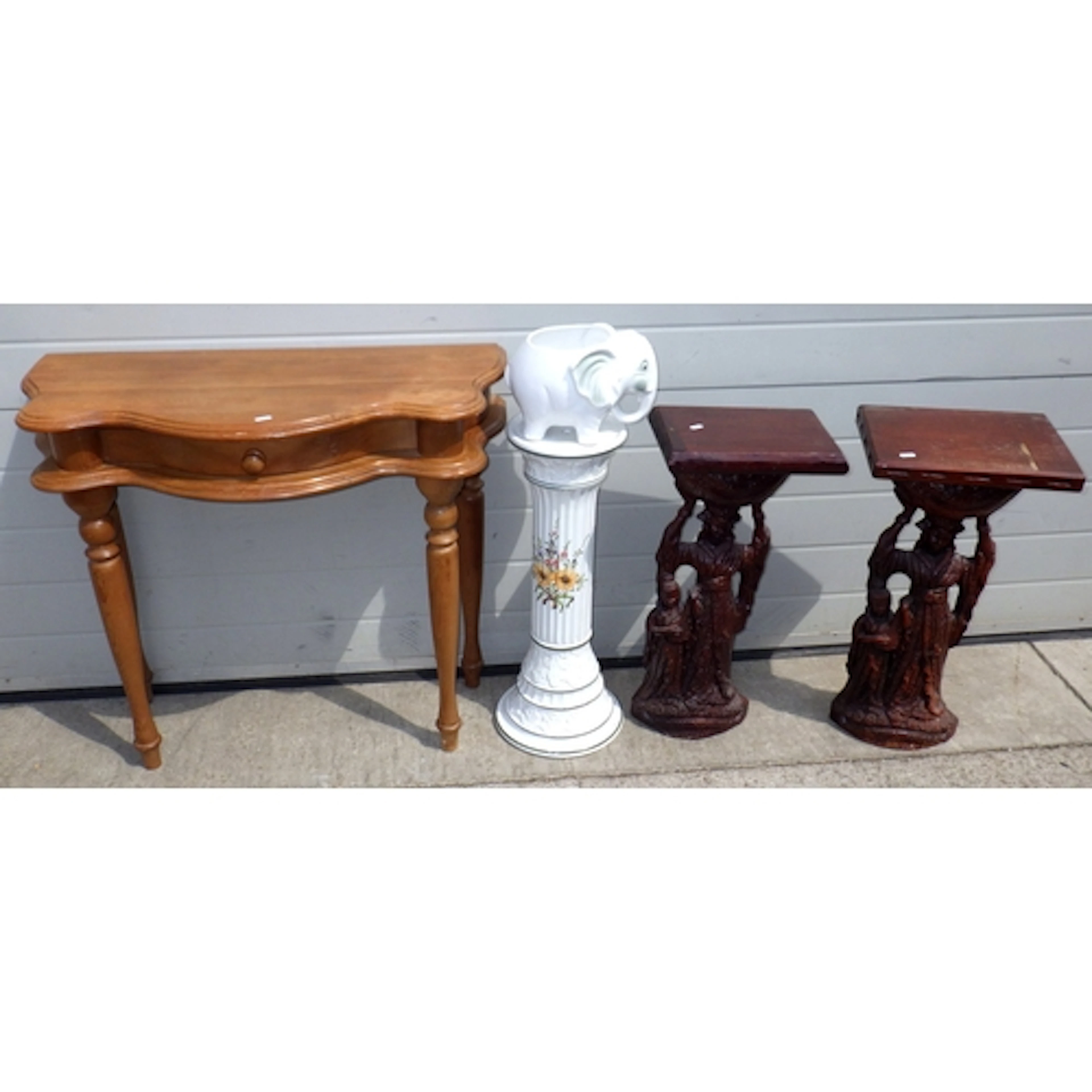 A pine side table, pair of stands and a ceramic elephant jar...