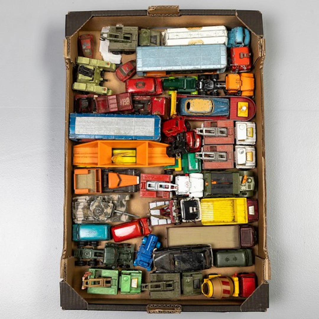 Fruit tray containing unboxed playworn Corgi/Dinky and Match...