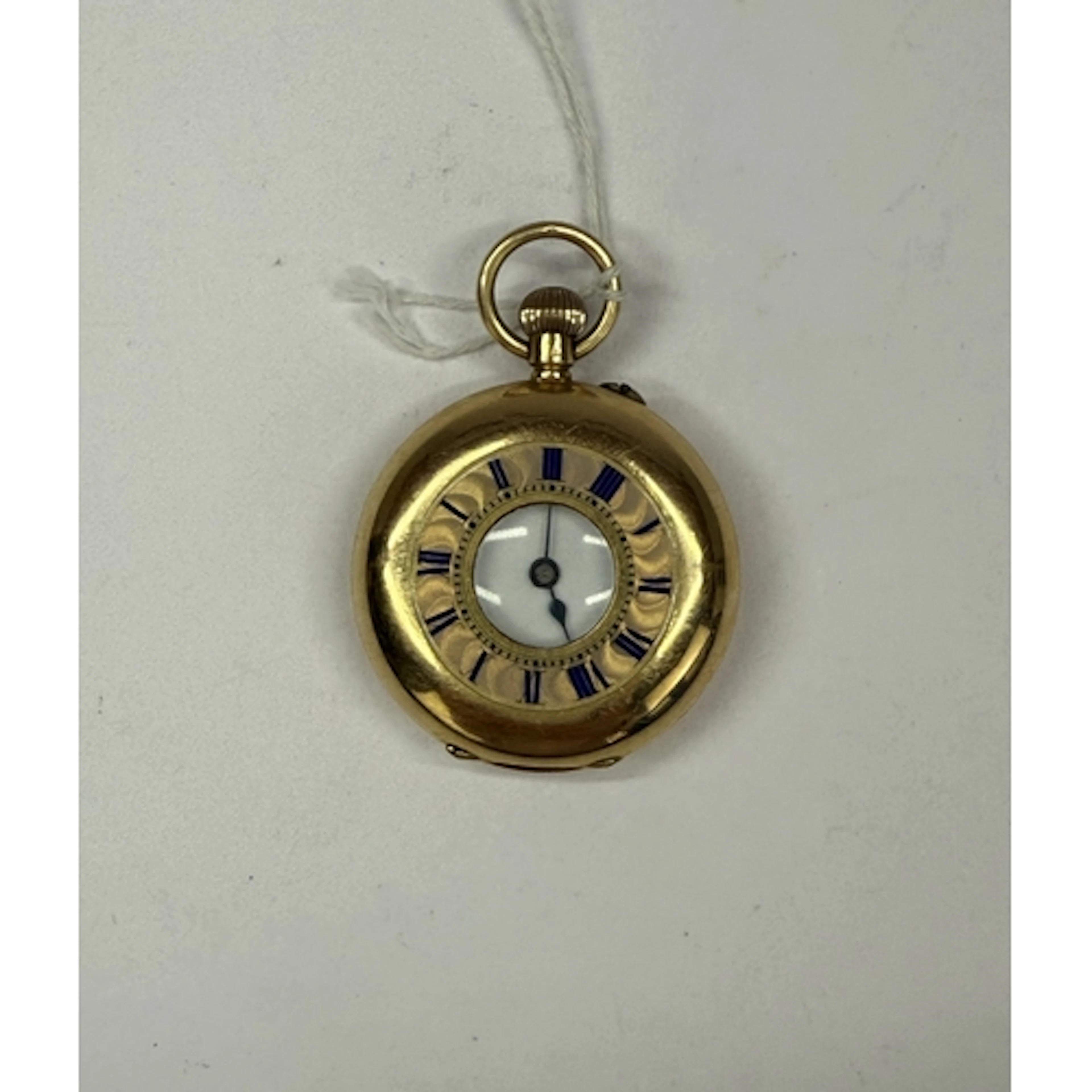 Watches: a yellow metal half hunter pin set fob watch, marke...
