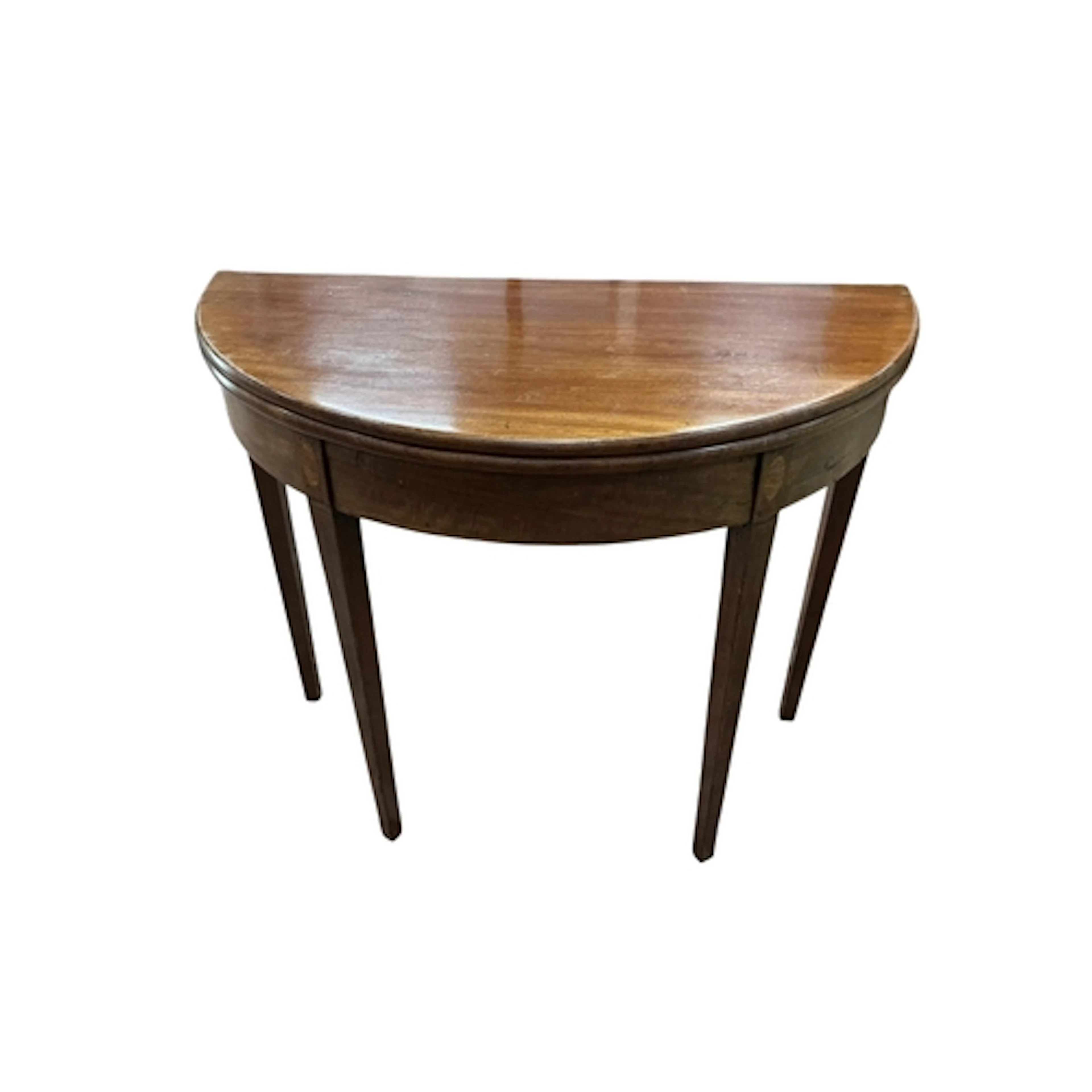 A George III inlaid mahogany demi-lune folding tea table, wi...