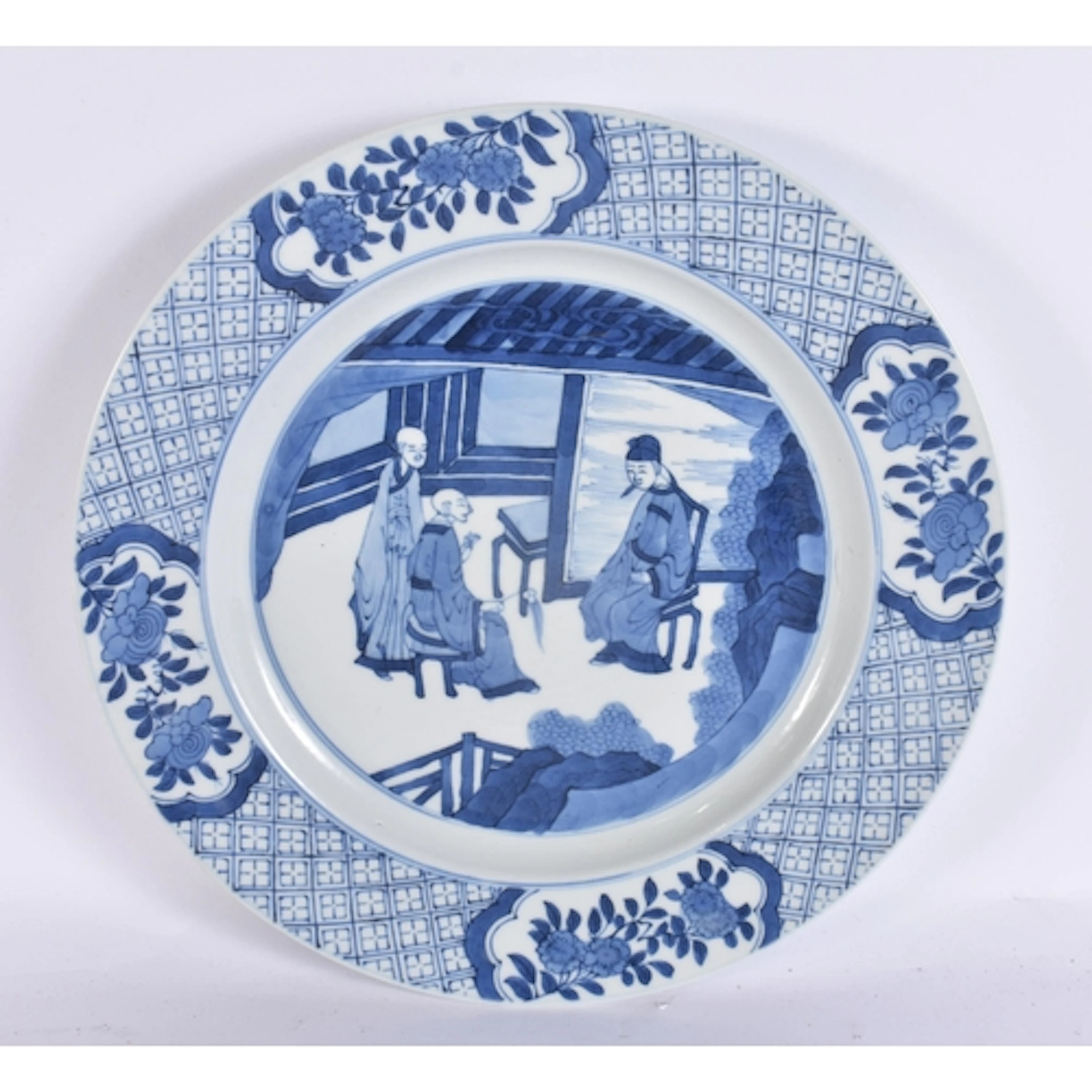 A CHINESE QING DYNASTY BLUE AND WHITE PORCELAIN PLATE bearin...