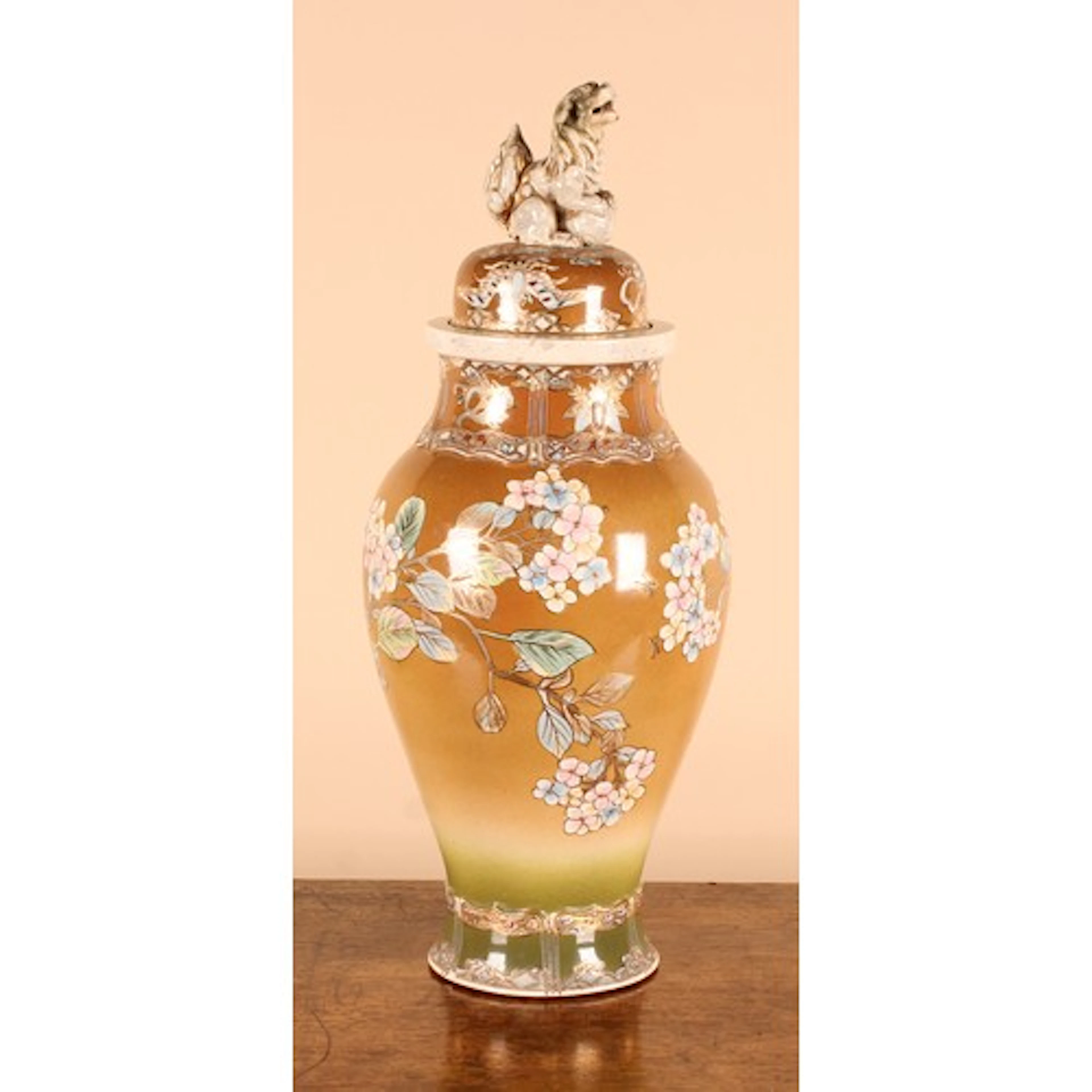 A Japanese Meiji period Satsuma vase and cover, fu dog finia...
