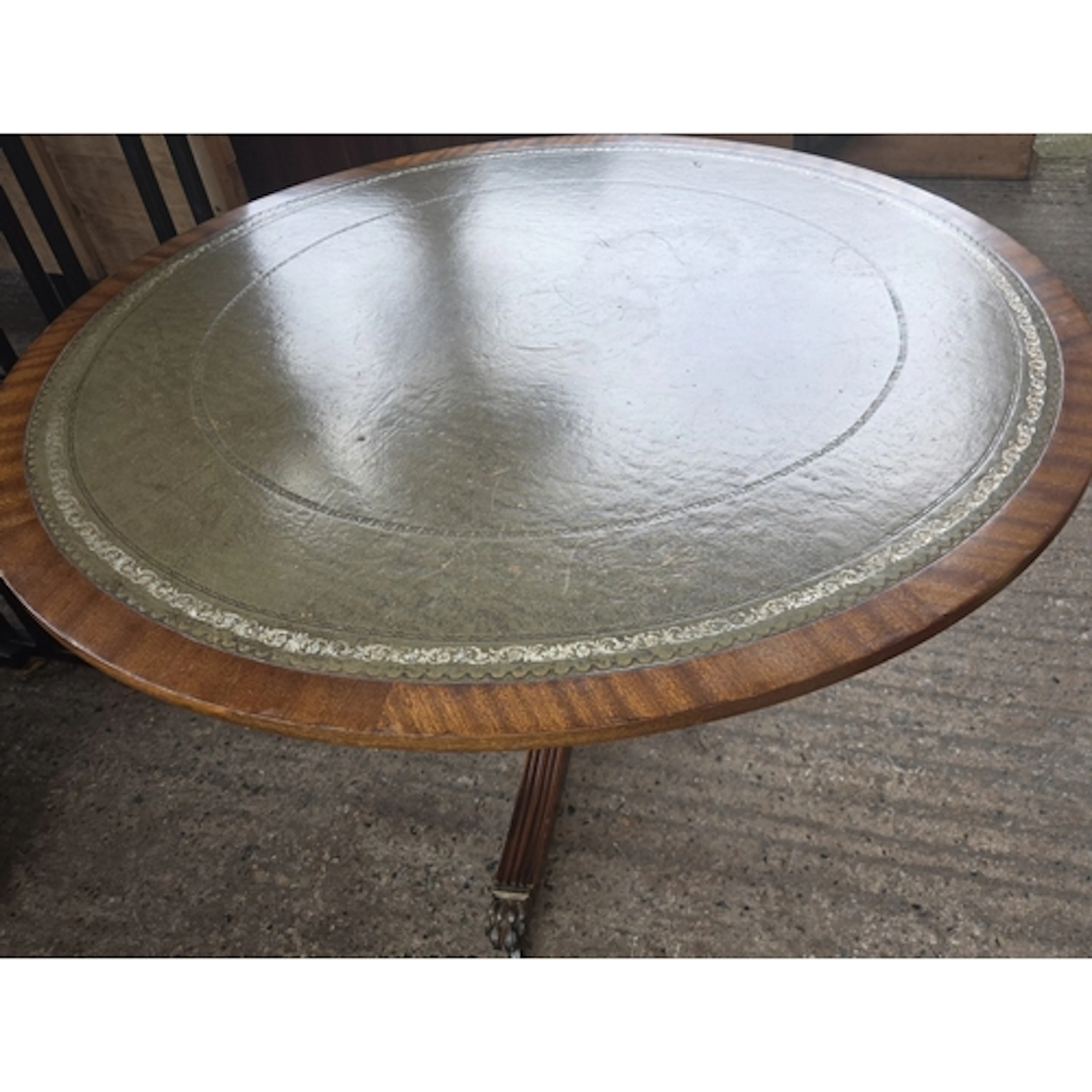 A Regency style coffee table on tripod base ( 106cm width x ...
