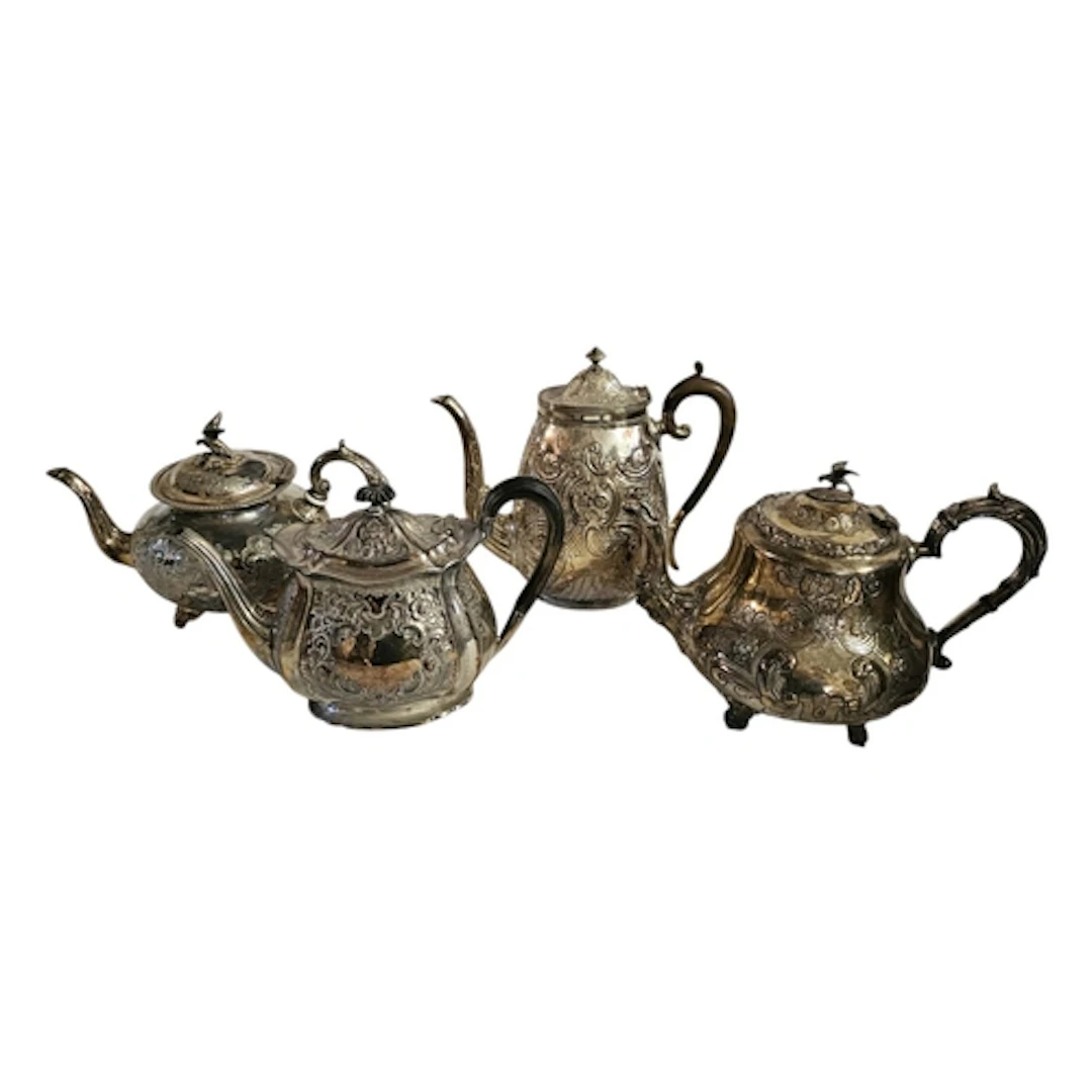 A COLLECTION OF FOUR 19TH CENTURY SILVER PLATED TEAPOTS Two ...