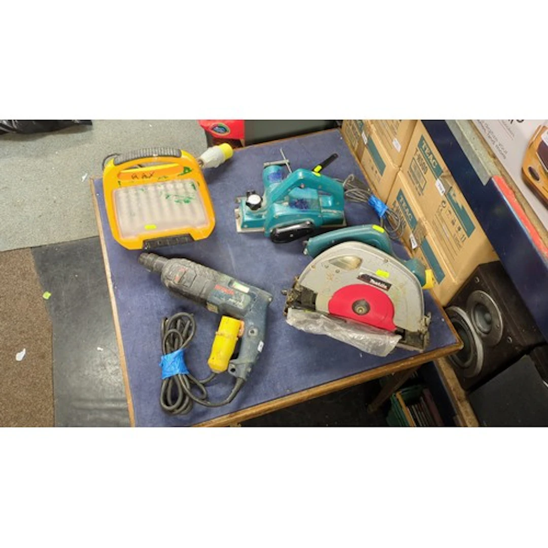 A group of 110V equipment comprising a Makita 5704R circular...