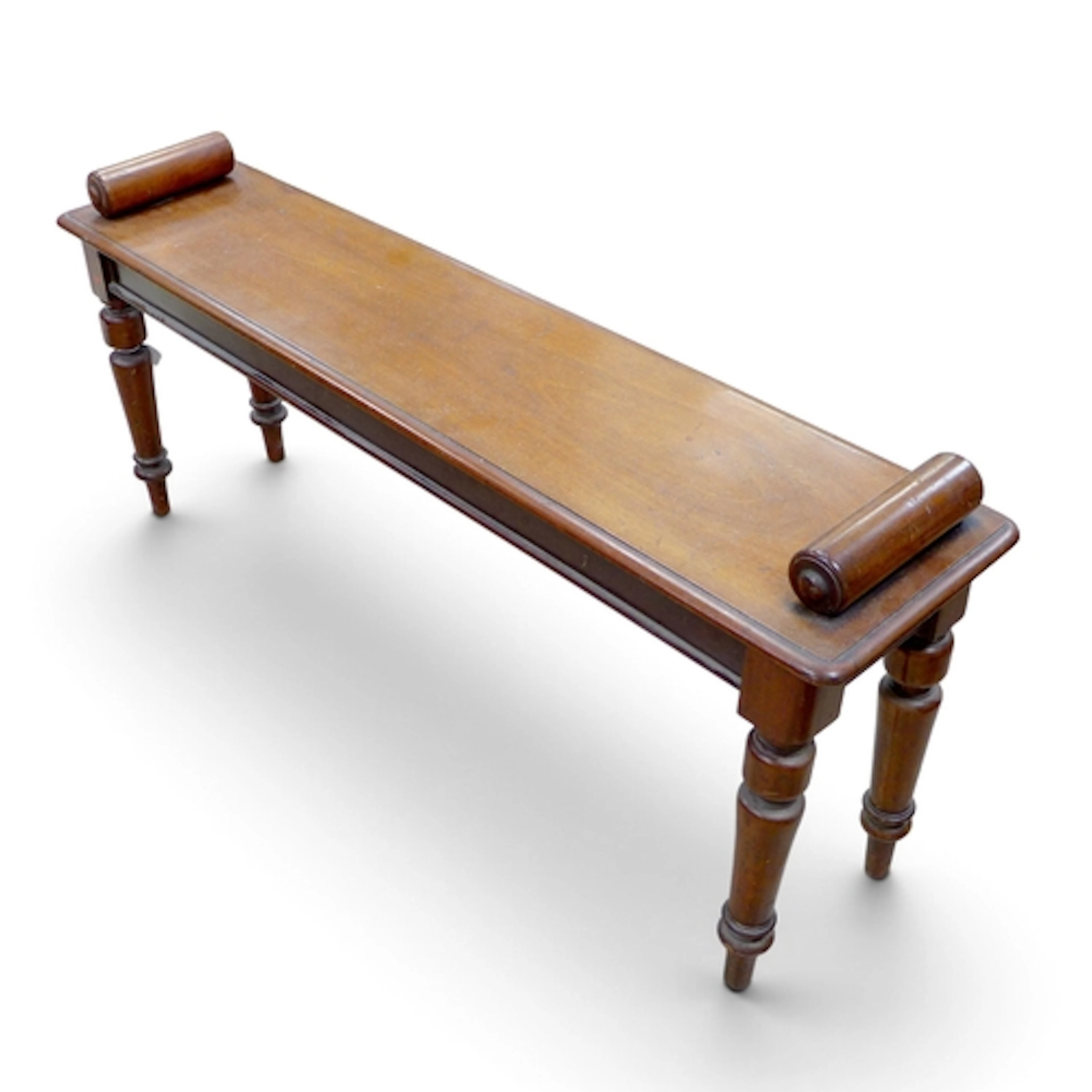 A VICTORIAN MAHOGANY WINDOW SEAT. sending on turned legs, 12...