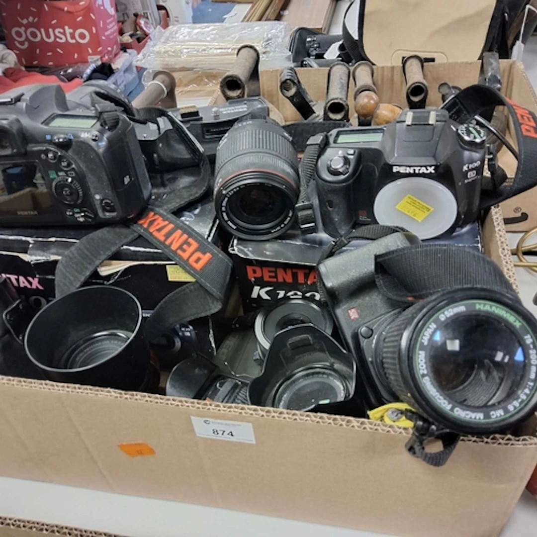 A GROUP OF PENTAX CAMERAS to include a boxed K100D, a boxed ...