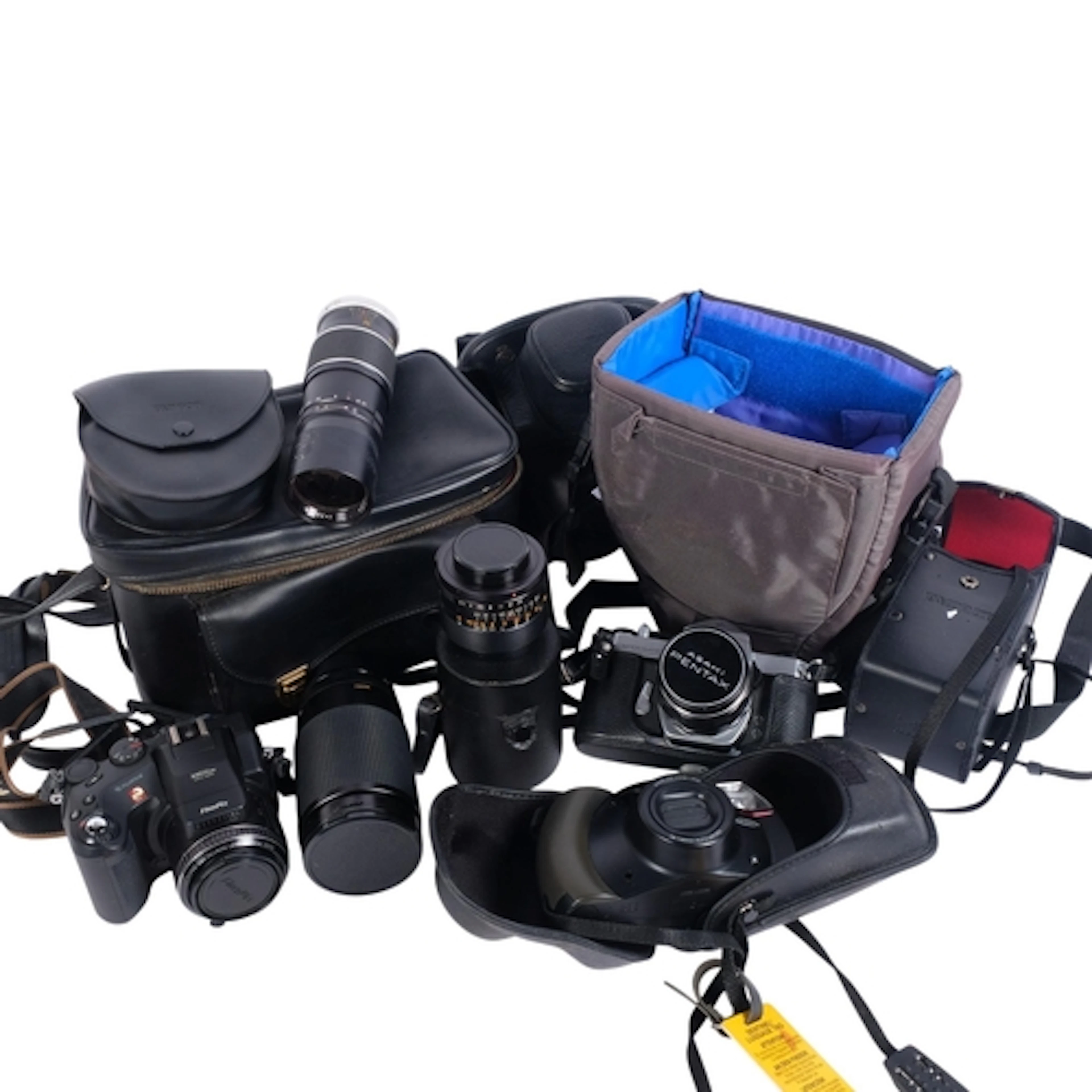 A collection of cameras, including a Fujifilm Finepix S60, a...