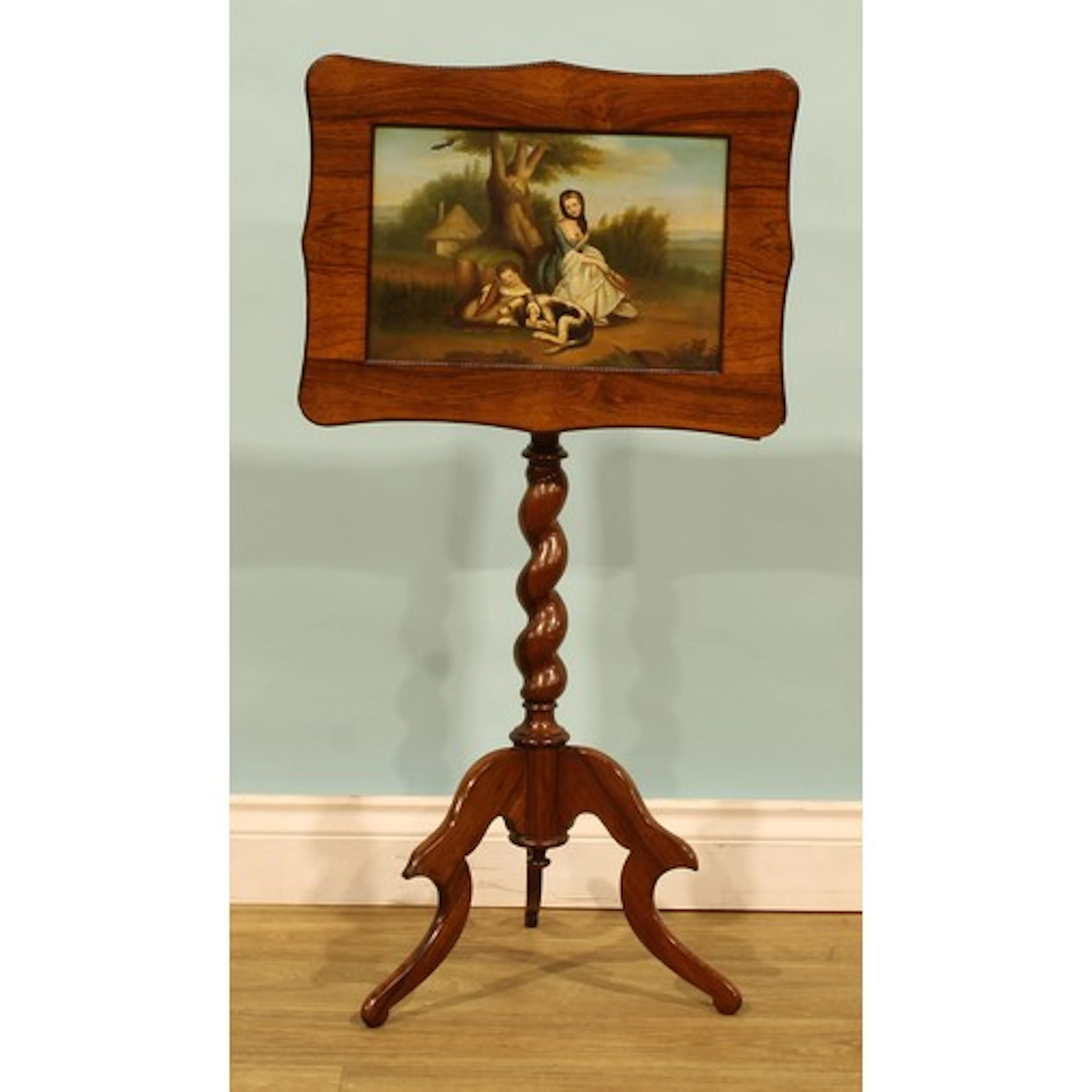 A 19th century rosewood tripod occasional table, shaped rect...