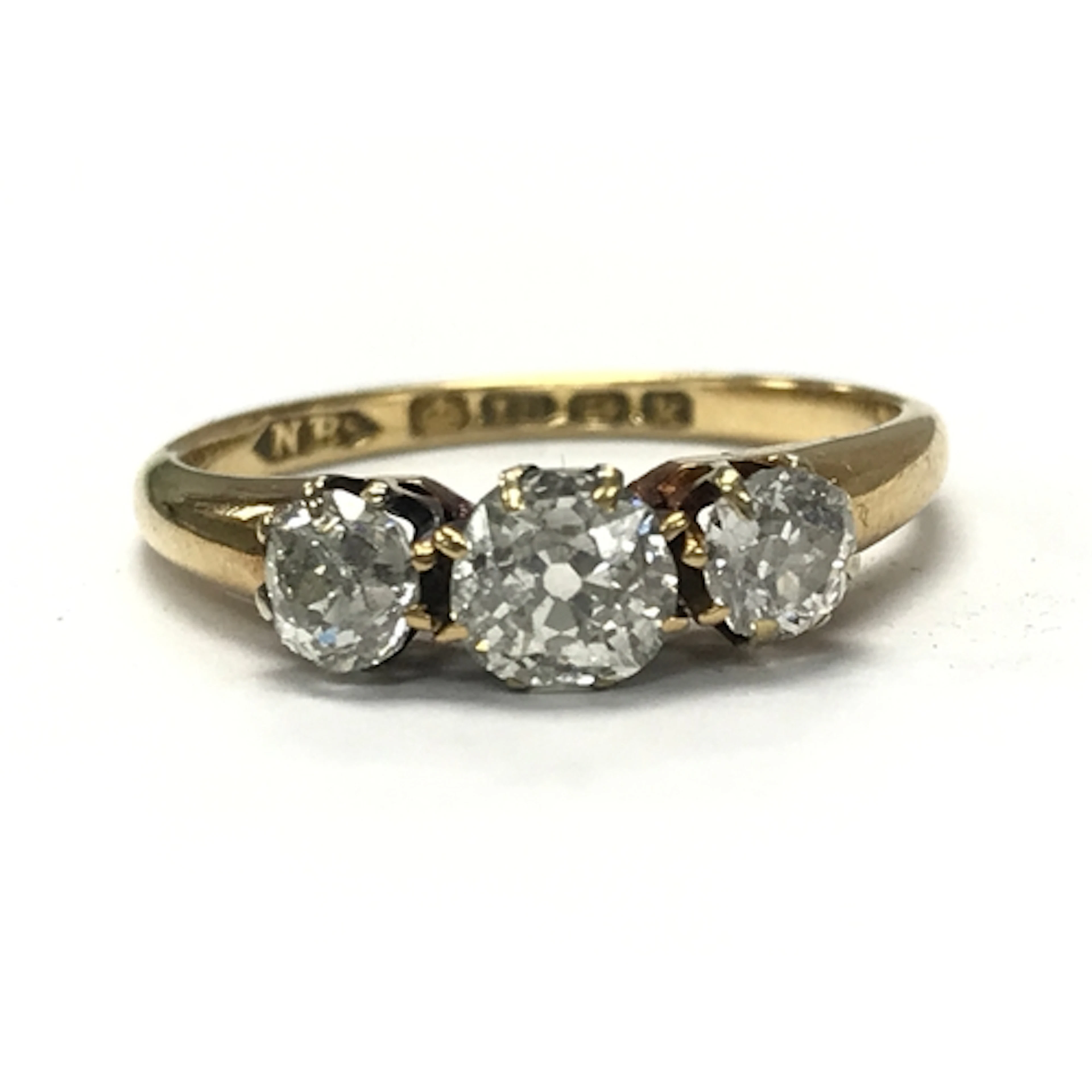 An 18ct gold diamond trilogy ring, 2.8g total weight size L/...
