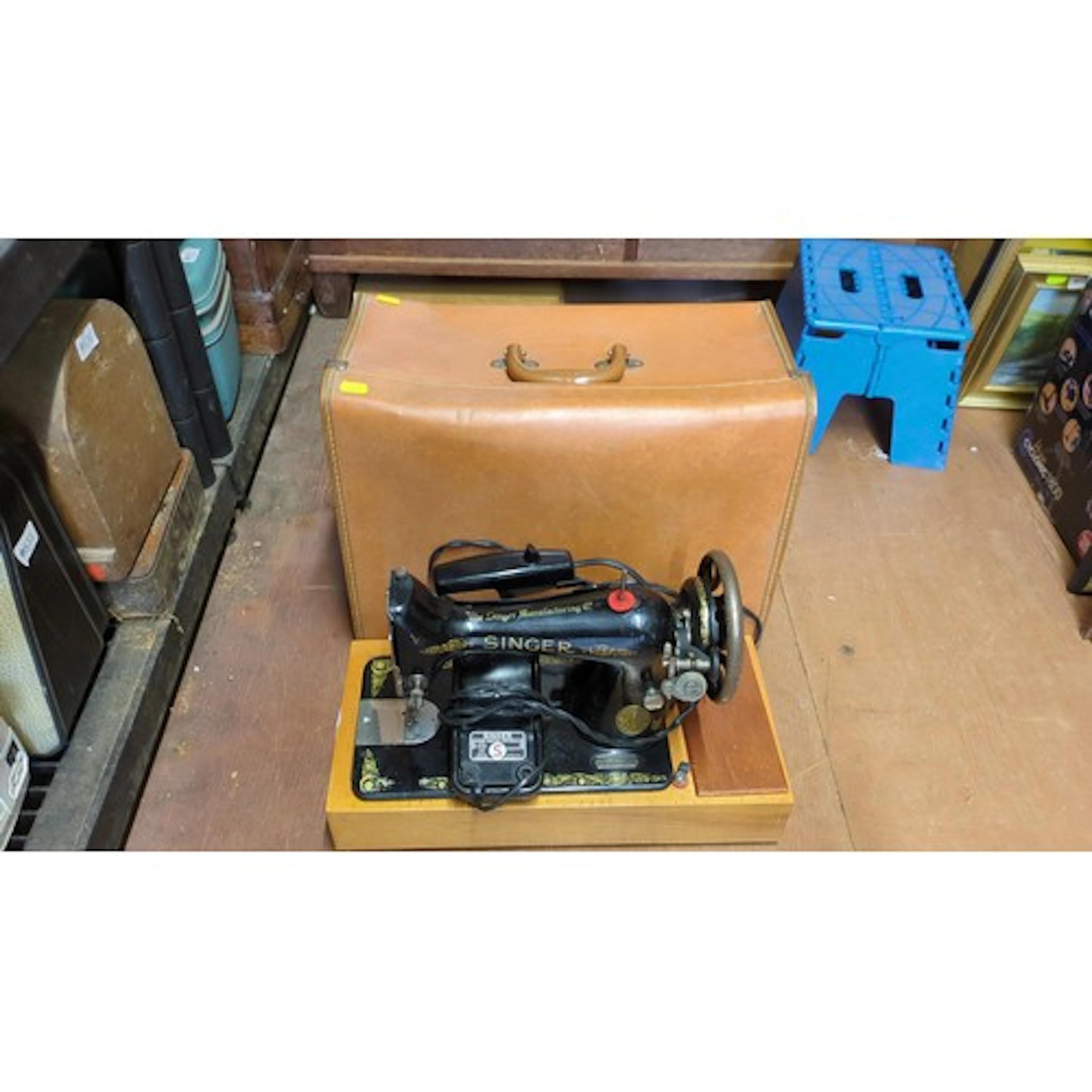 Singer electric sewing machine with gilt-printed decoration,...