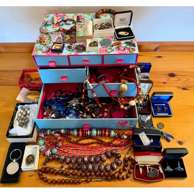 A large quantity of costume jewellery to include sterling si...