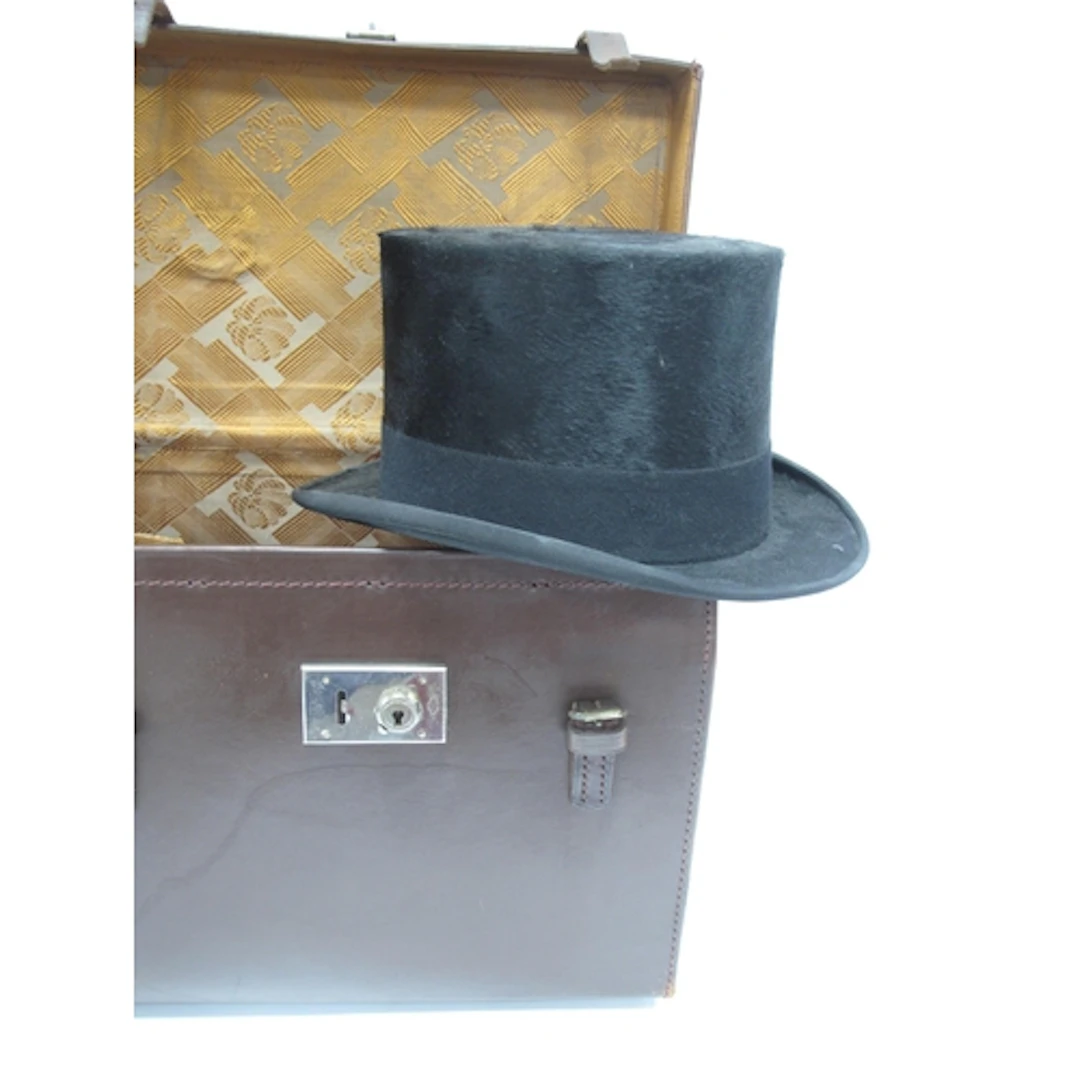An Early 1900s Silk Top Hat by 'Rowans' - leather rim - in t...