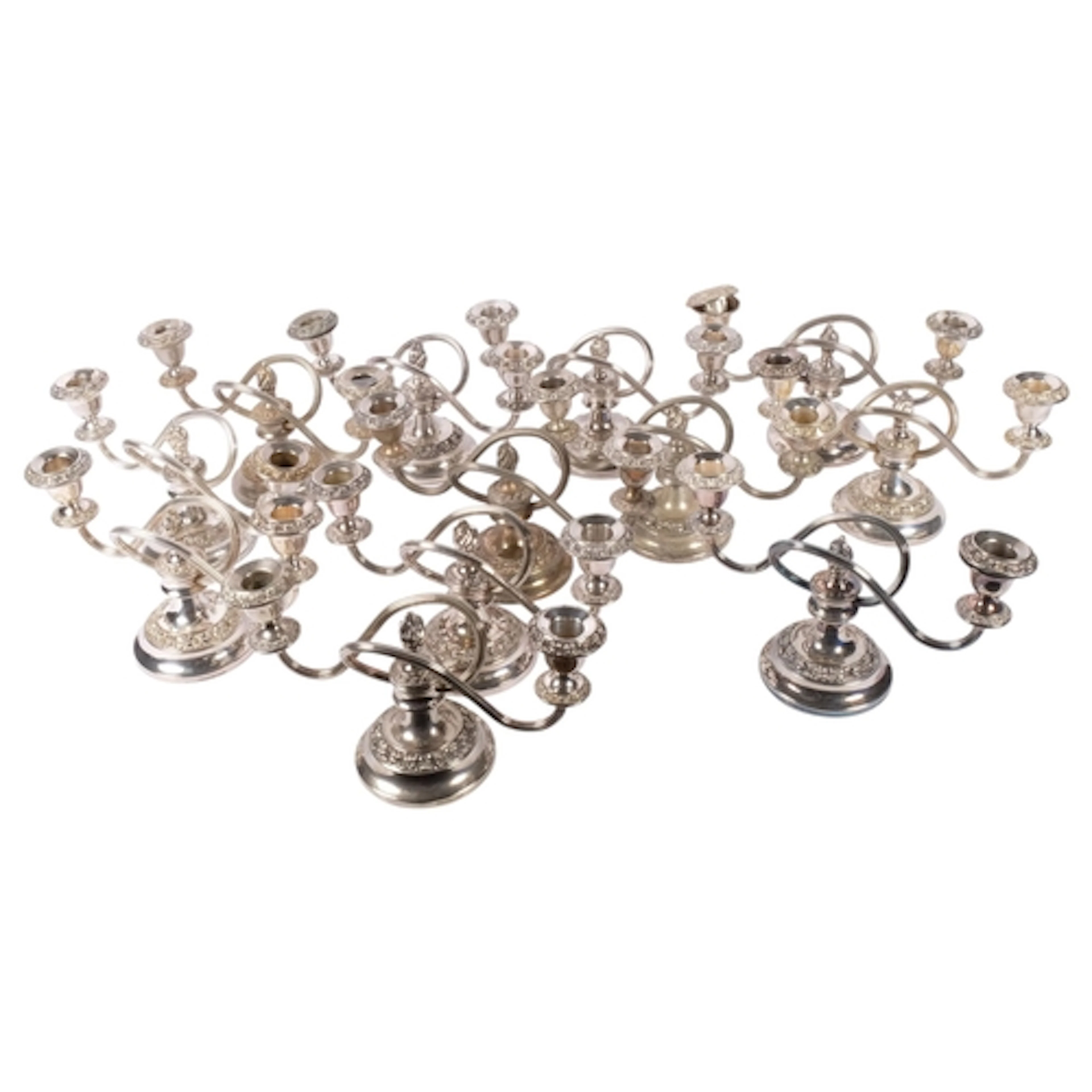 A box containing a variety of Victorian design silver plated...