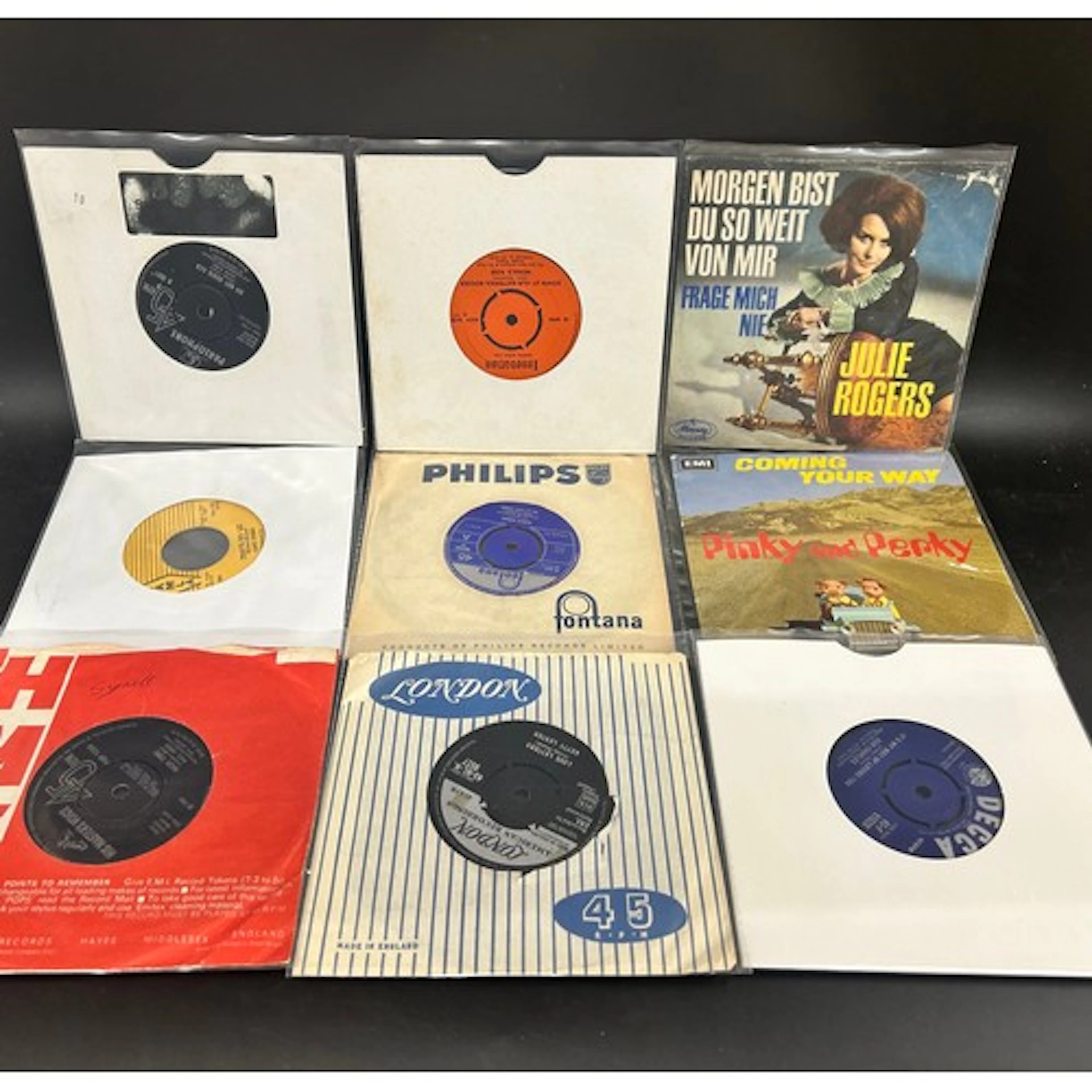 Collection of vinyl 45rpm singles assorted to include Lou Ch...