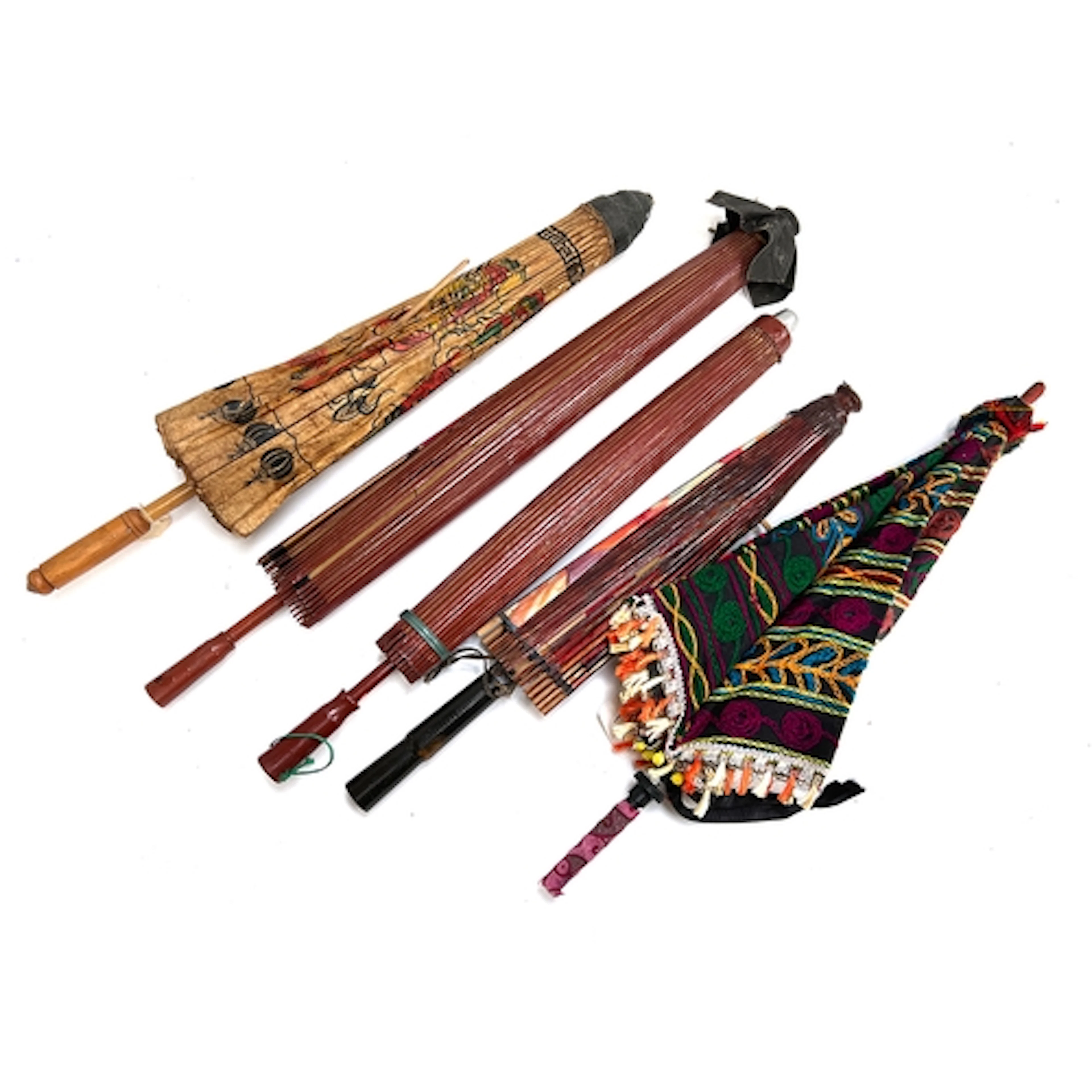 A collection of mainly Japanese vintage waxed paper parasols...