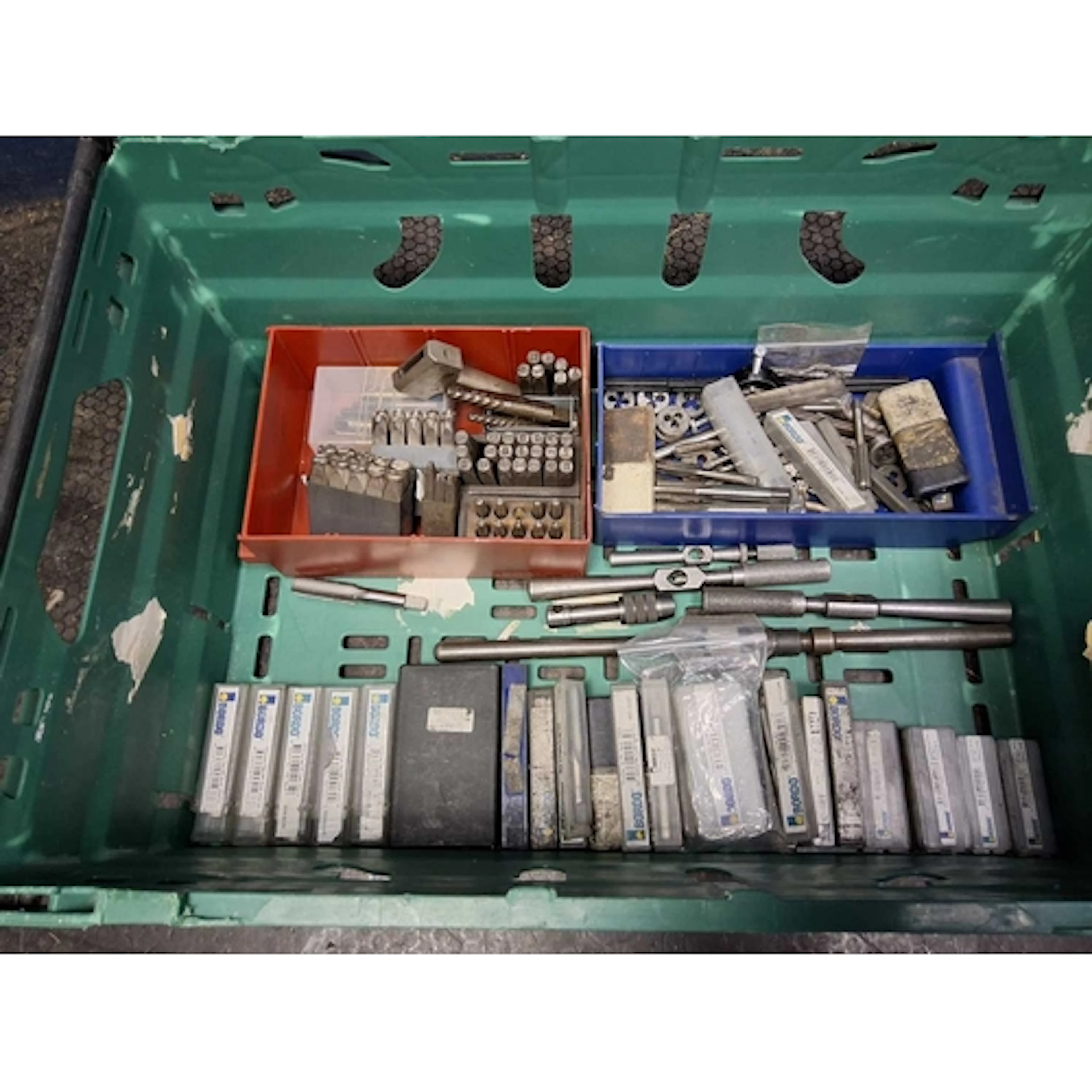 A TRAY CONTAINING ENGINEERS' TAPS, DIES, WRENCHES AND LETTER...
