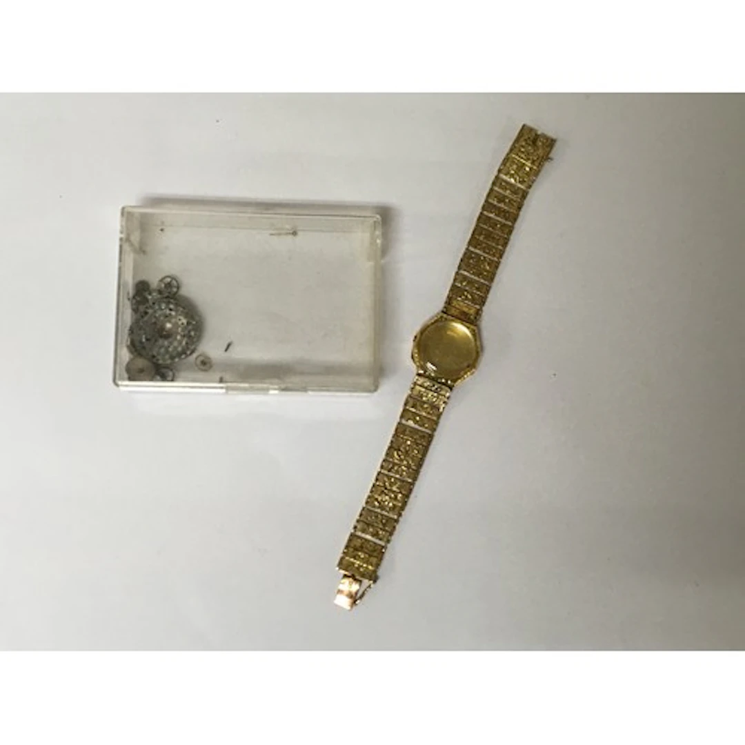 A 14k gold Doxa lady's wristwatch, having engraved articulat...