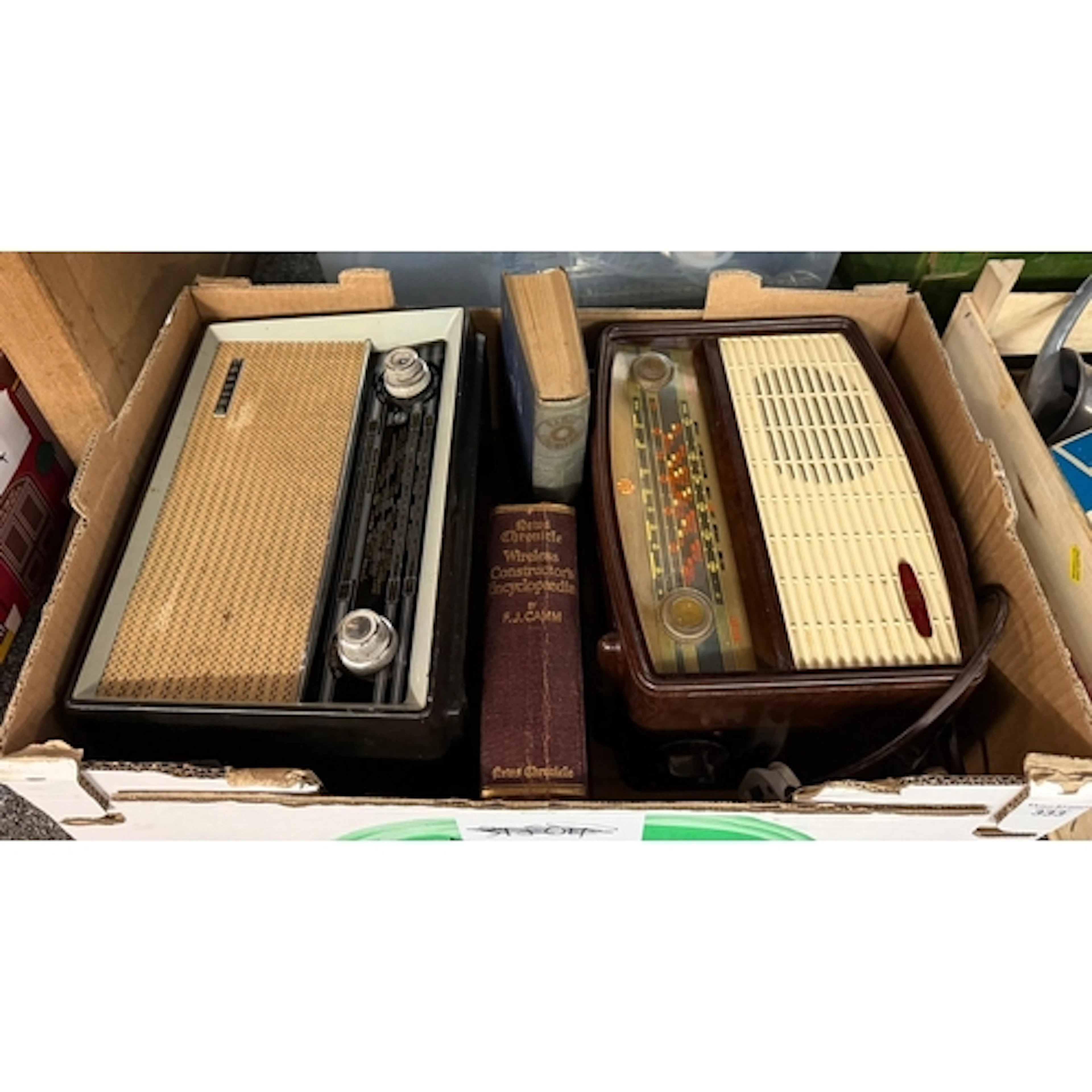Box of mixed items to include: two vintage radios, one marke...