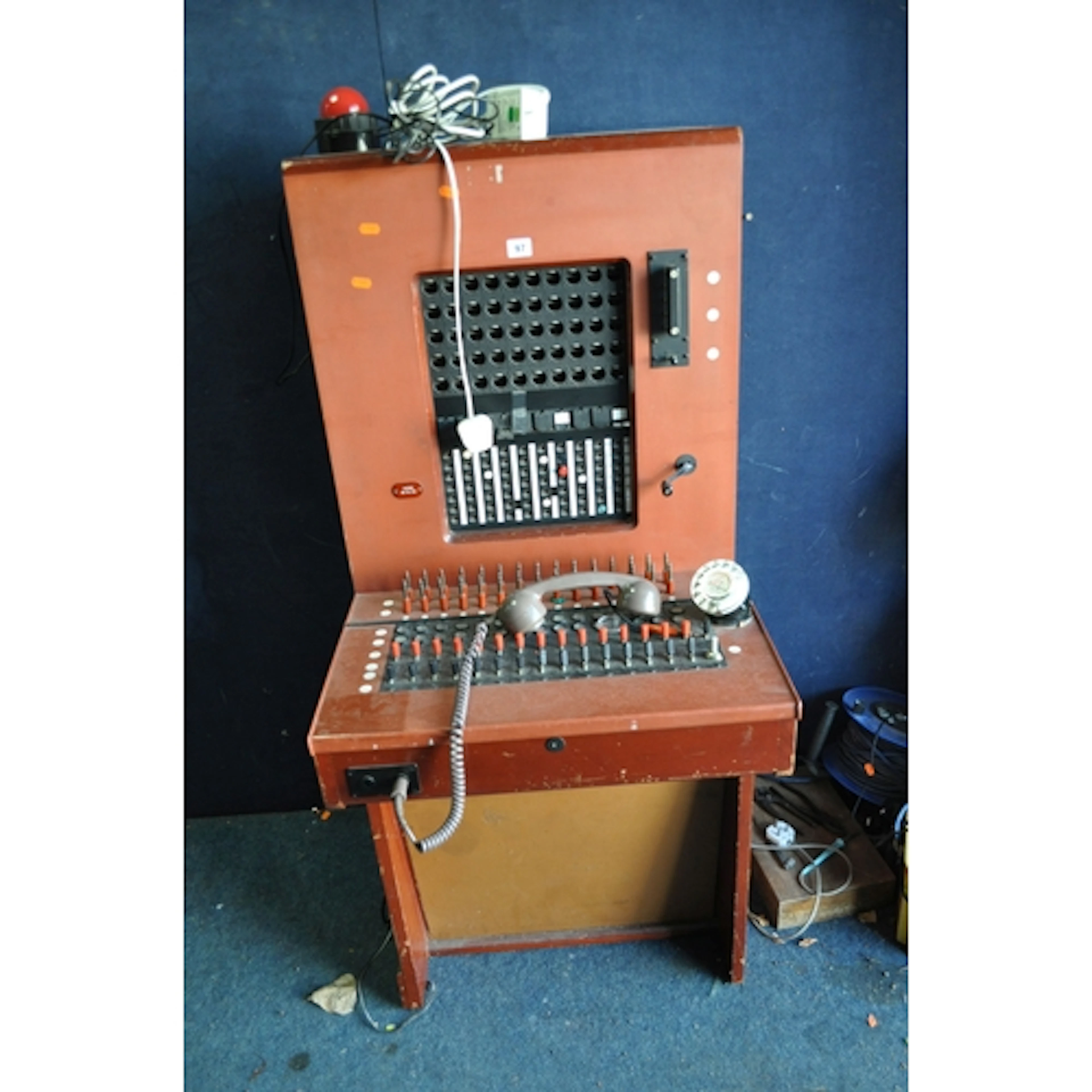 A MID 20th CENTURY TELEPHONE EXCHANGE with detachable handse...