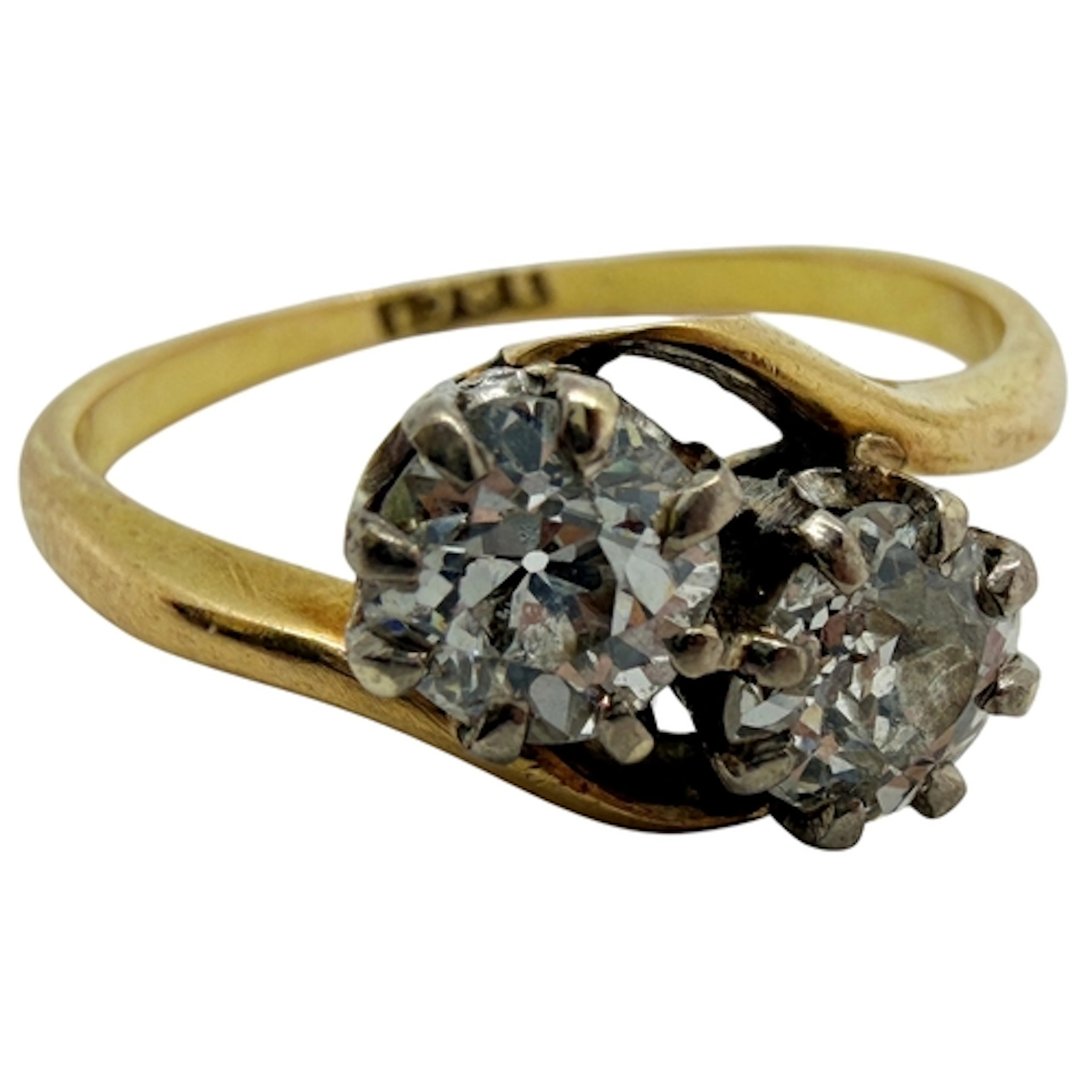 An antique Toi et Moi diamond ring, crossover claw-set with ...