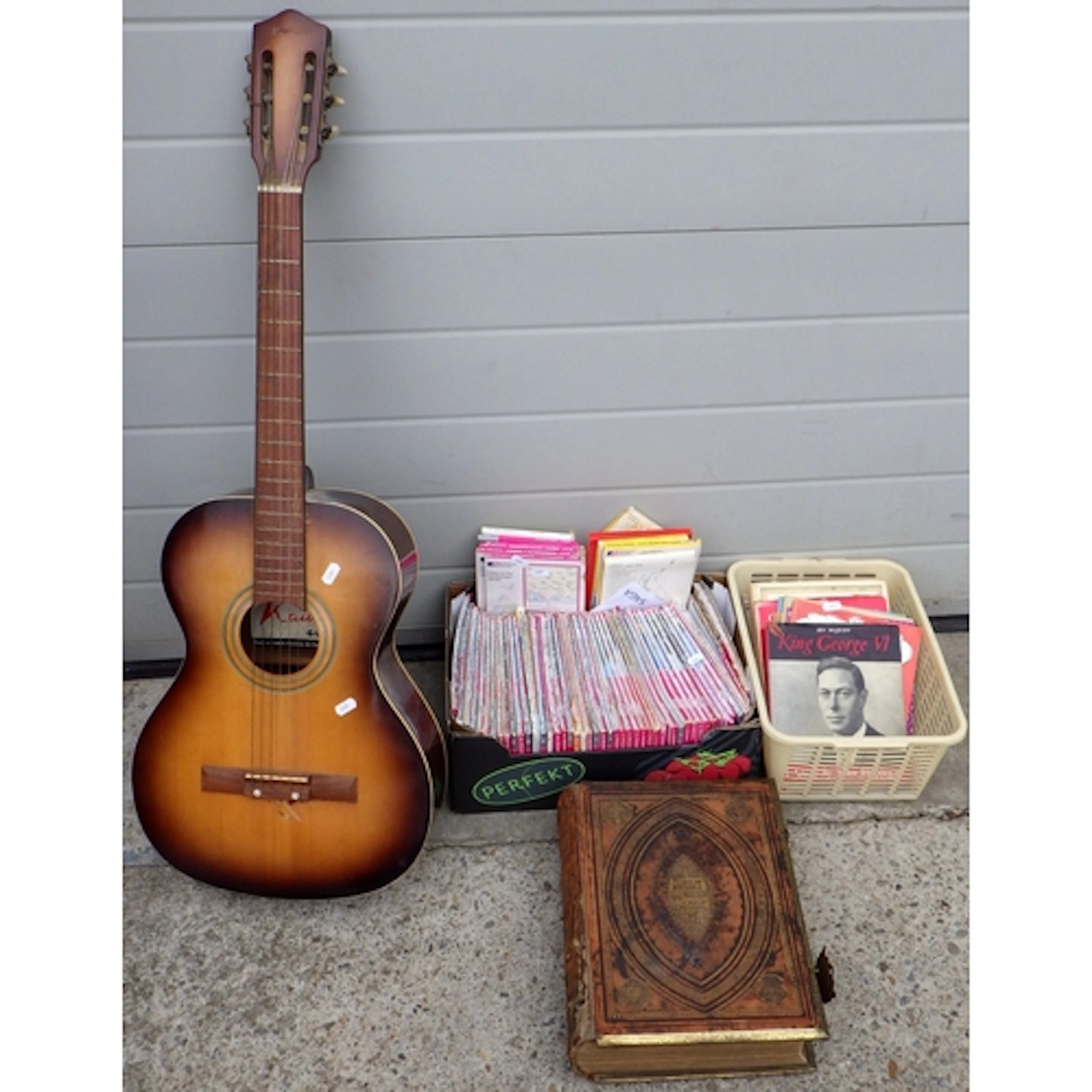 A guitar, Bible, O/S maps etc