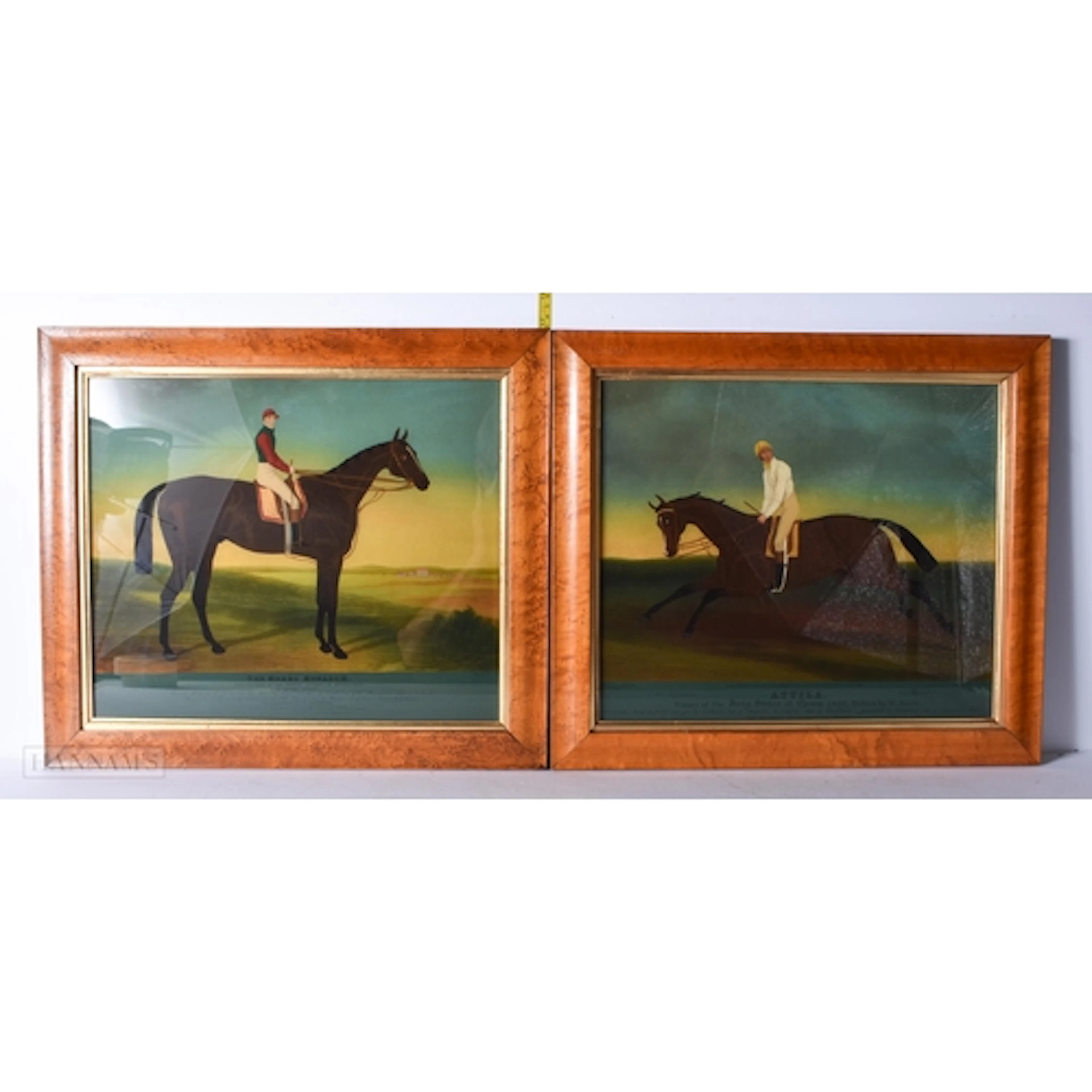 A pair of framed equestrian prints on glass 33 x 39.5cm fram...