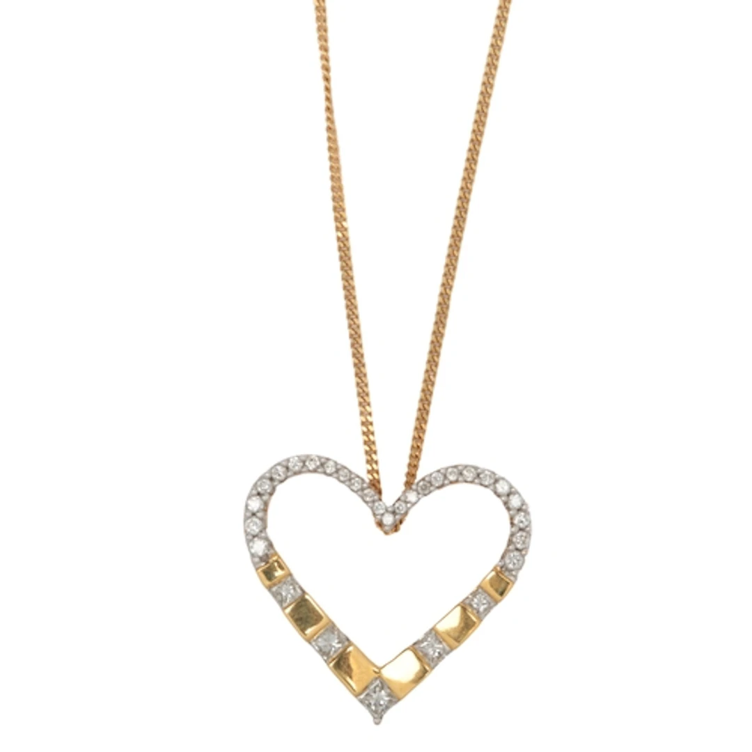 A diamond pendant necklace, designed as a heart, set with br...
