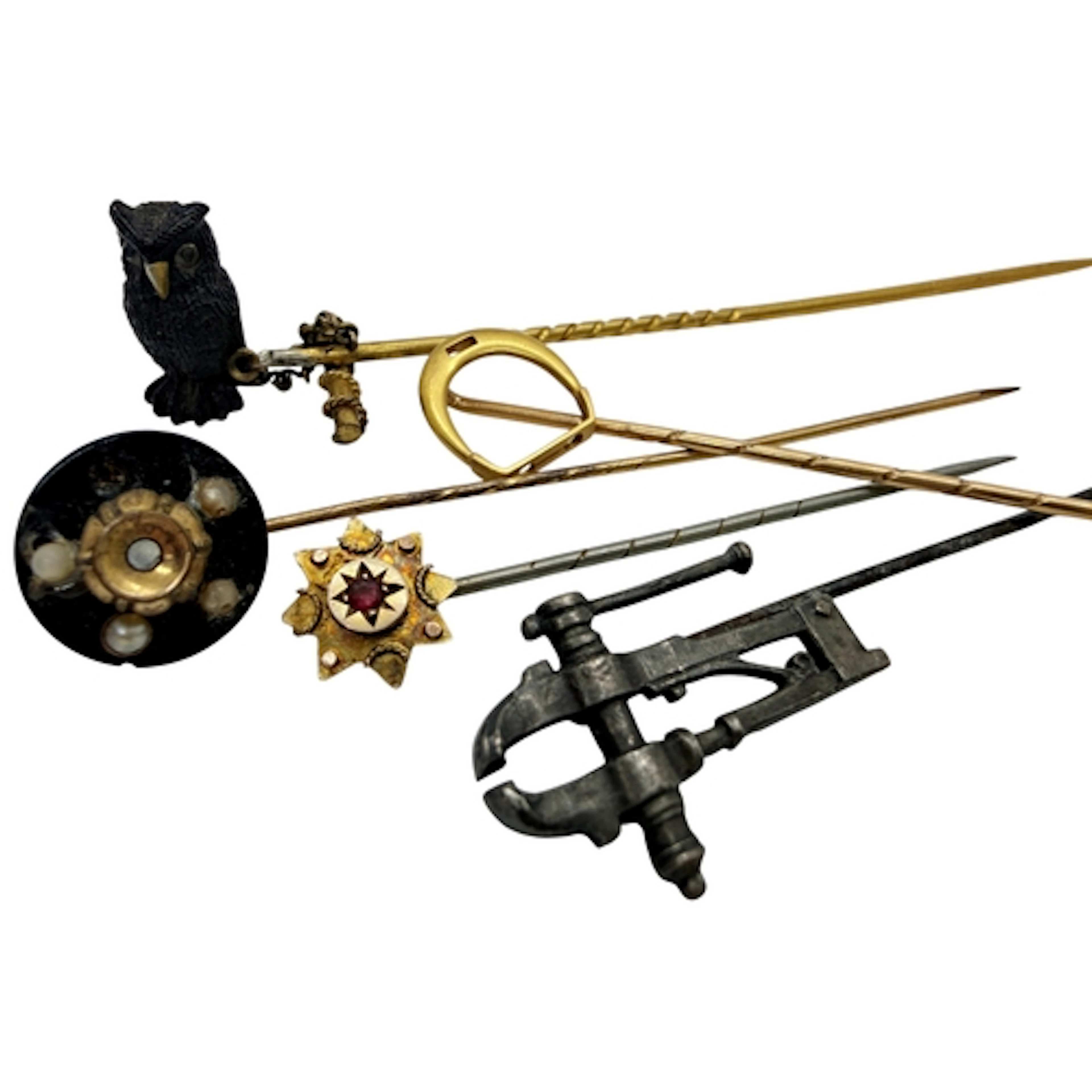 An Edwardian novelty stick pin, the twisted yellow metal T s...