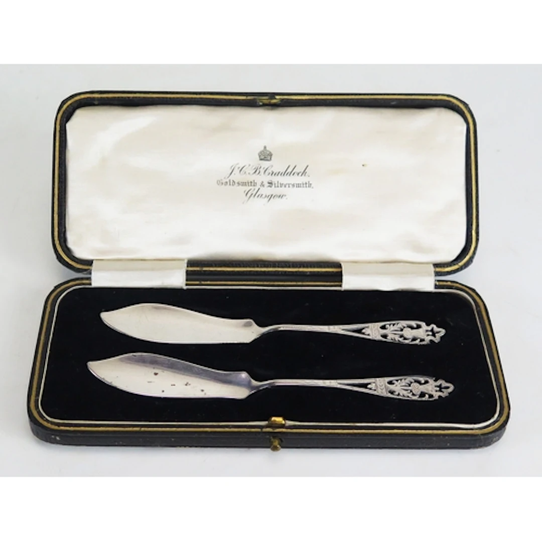 A pair of George V silver butter knives, maker Coper Bros & ...