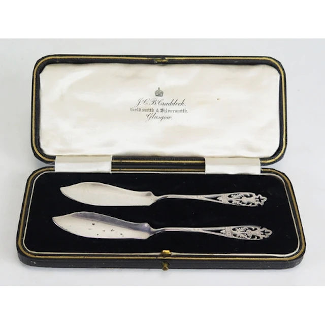 A pair of George V silver butter knives, maker Coper Bros & ...