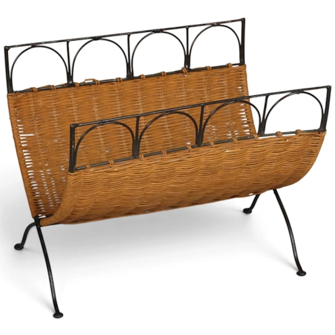 A rattan weave magazine rack on blackened metal frame, heigh...