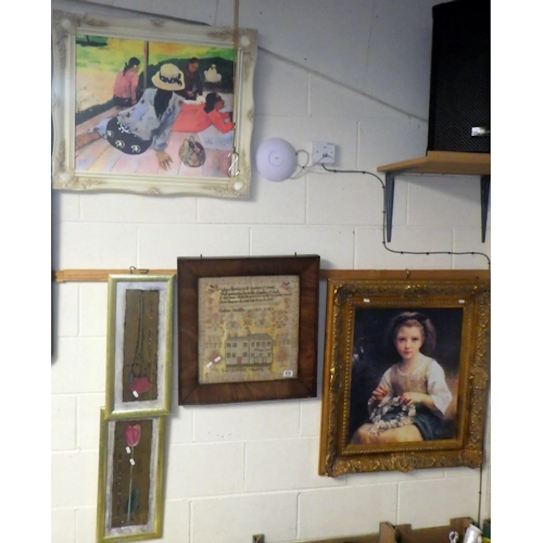 An AS Found Victorian sampler together with four framed prin...