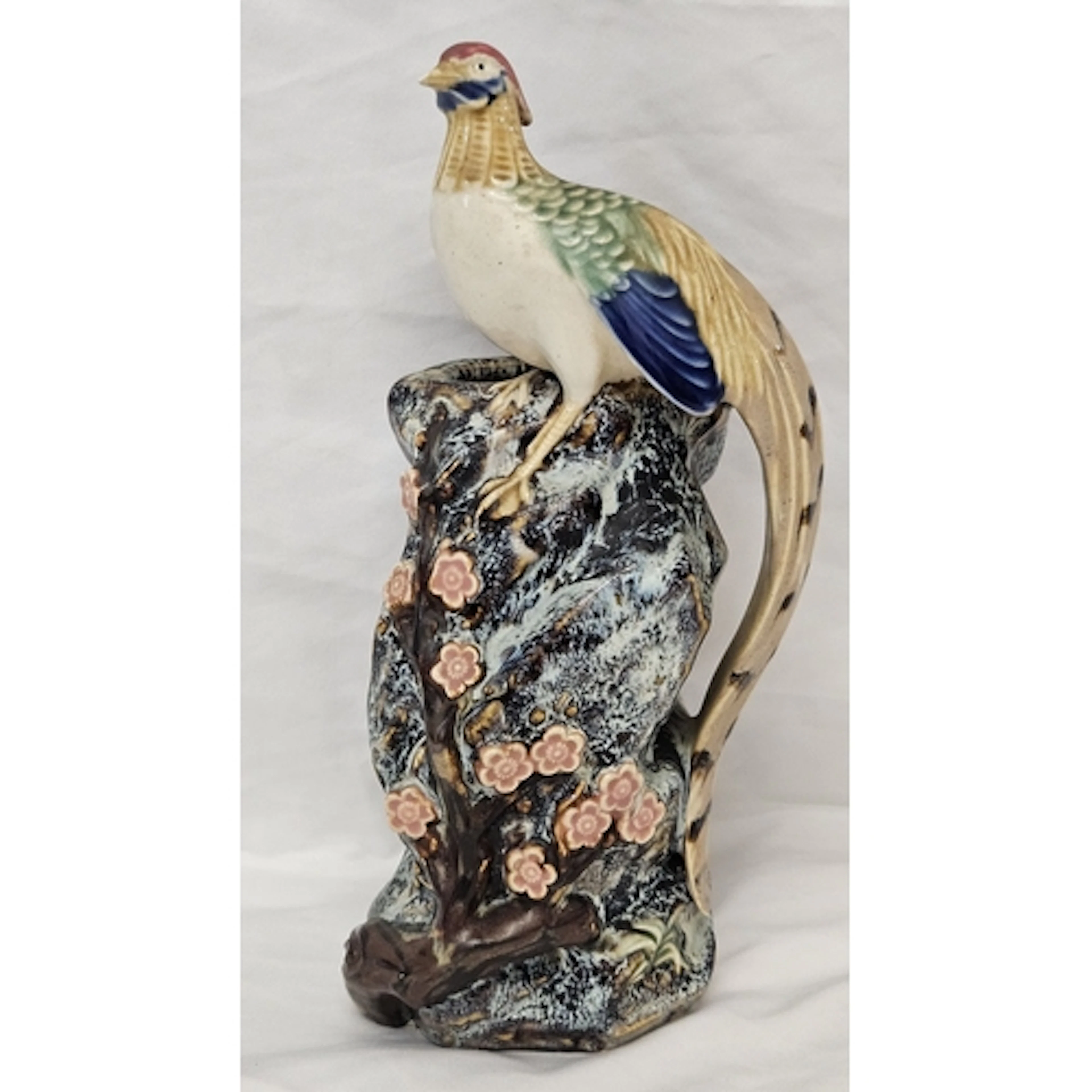 Chinese Shiwan Style Porcelain Figure of a bird perched on a...