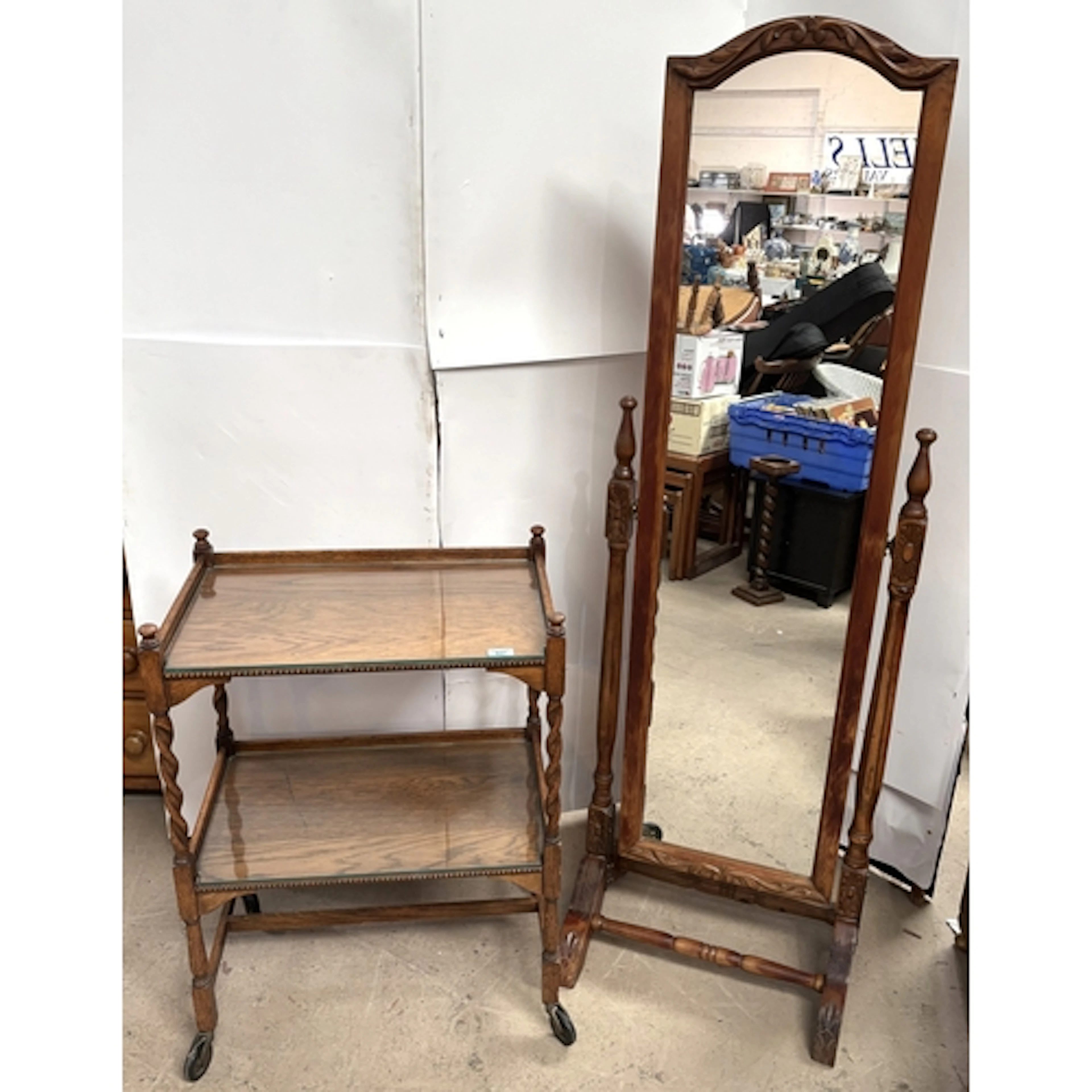 A 1920's oak 2 tier tea trolley with barley twist decoration...