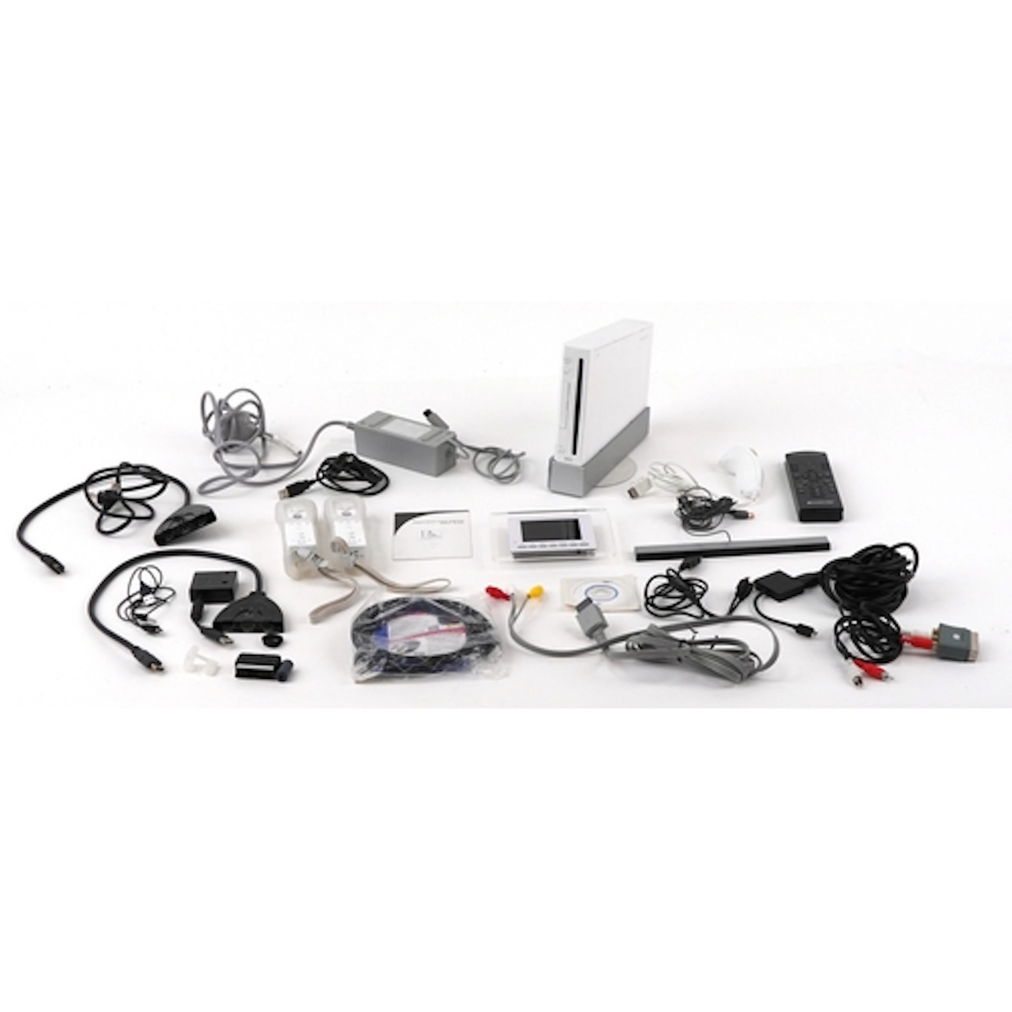 Nintendo Wii games console with controllers, cables and acce...