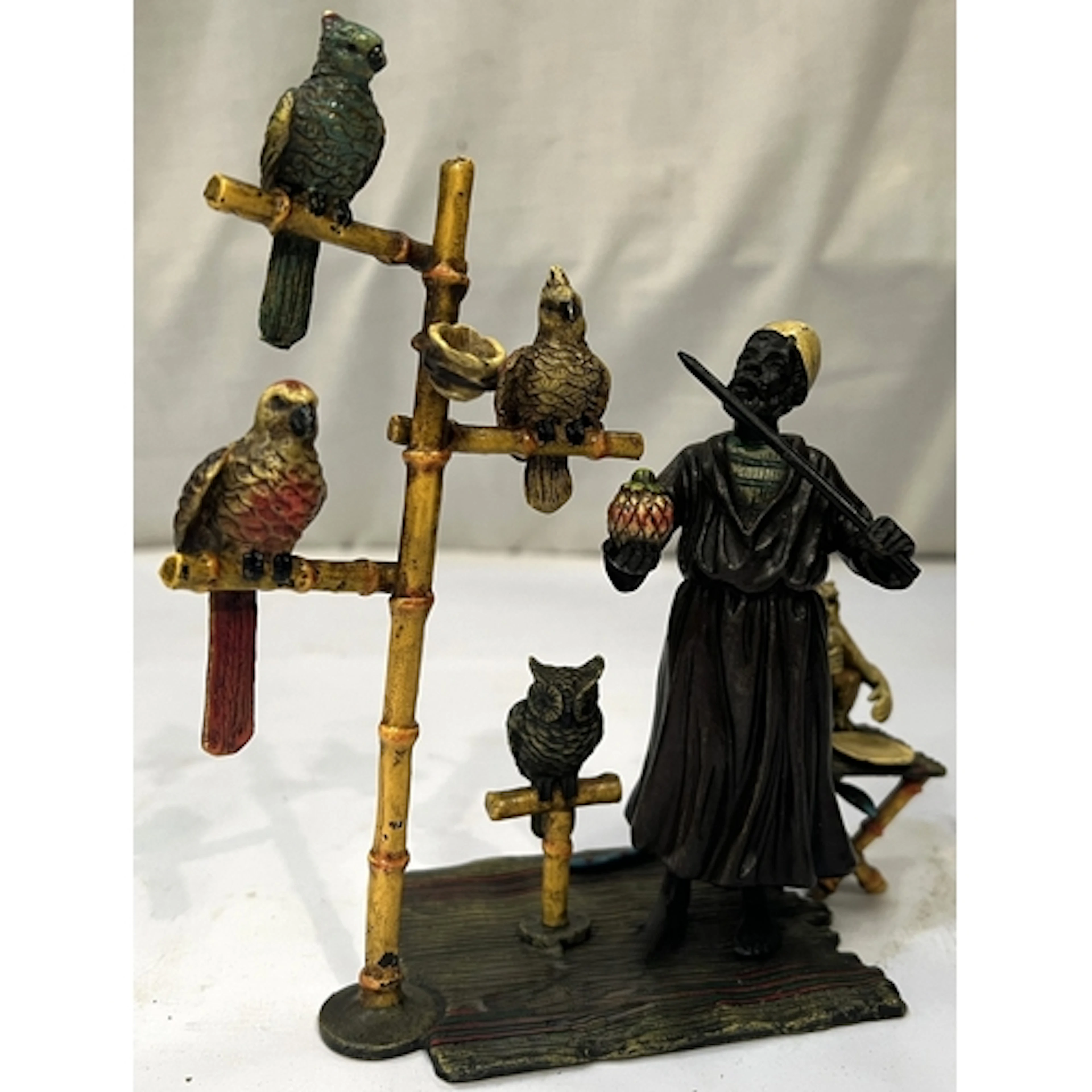 Cold painted bronze in the manner of Bergmann "Parrot Traine...
