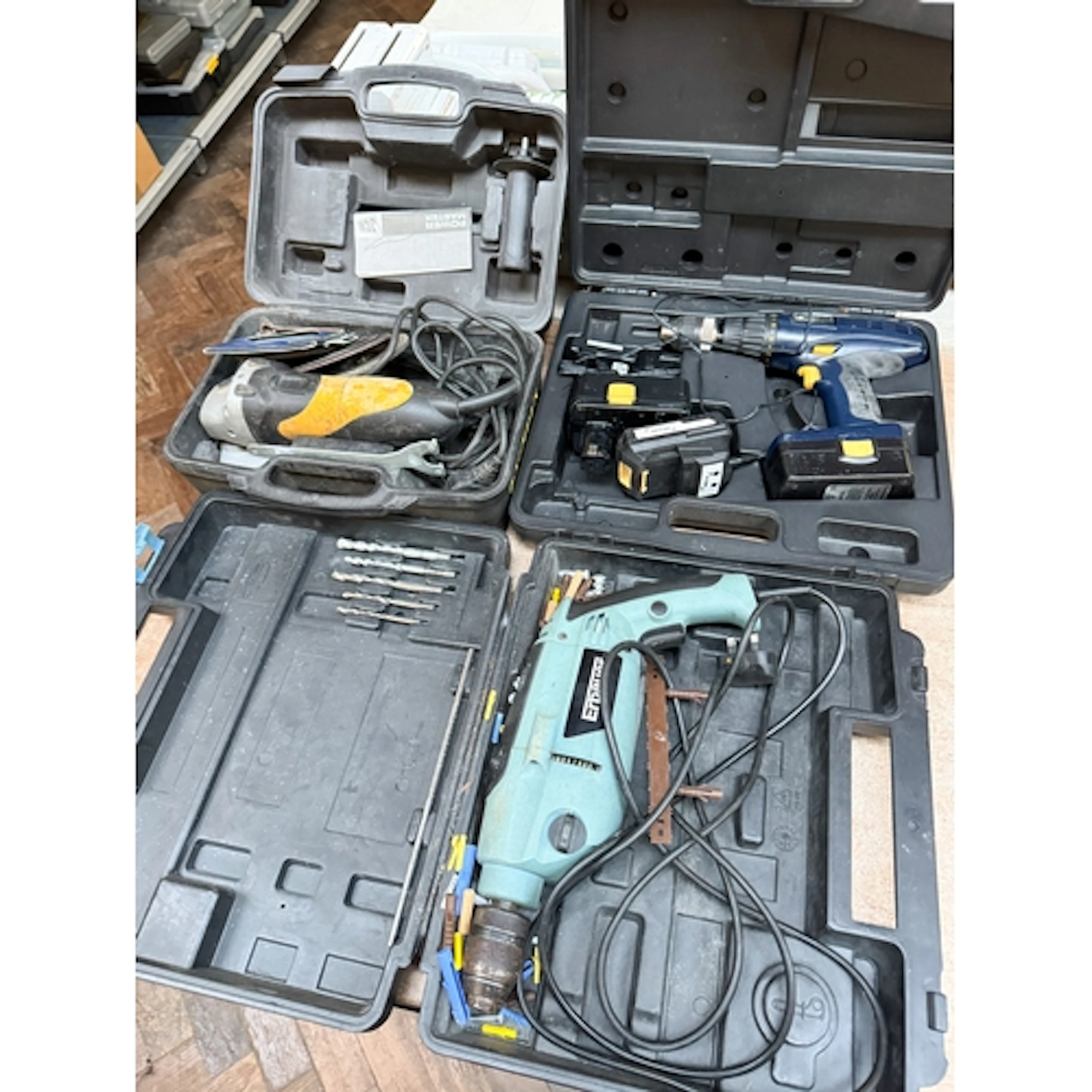 A JCB Powermaster angle grinder together with an Erbauer rot...