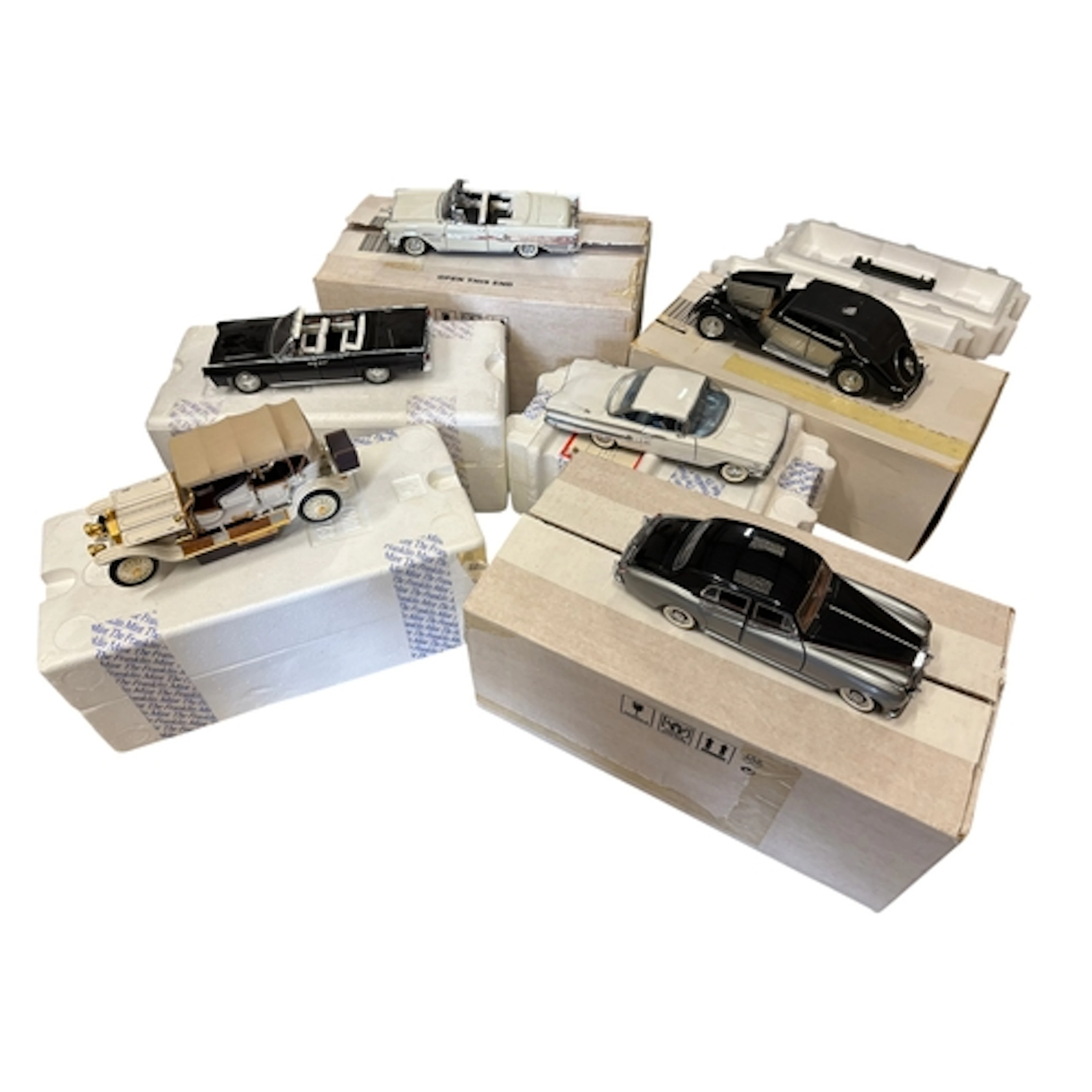 Six boxed Franklin Mint model vehicles; a 1911 Rolls-Royce T...