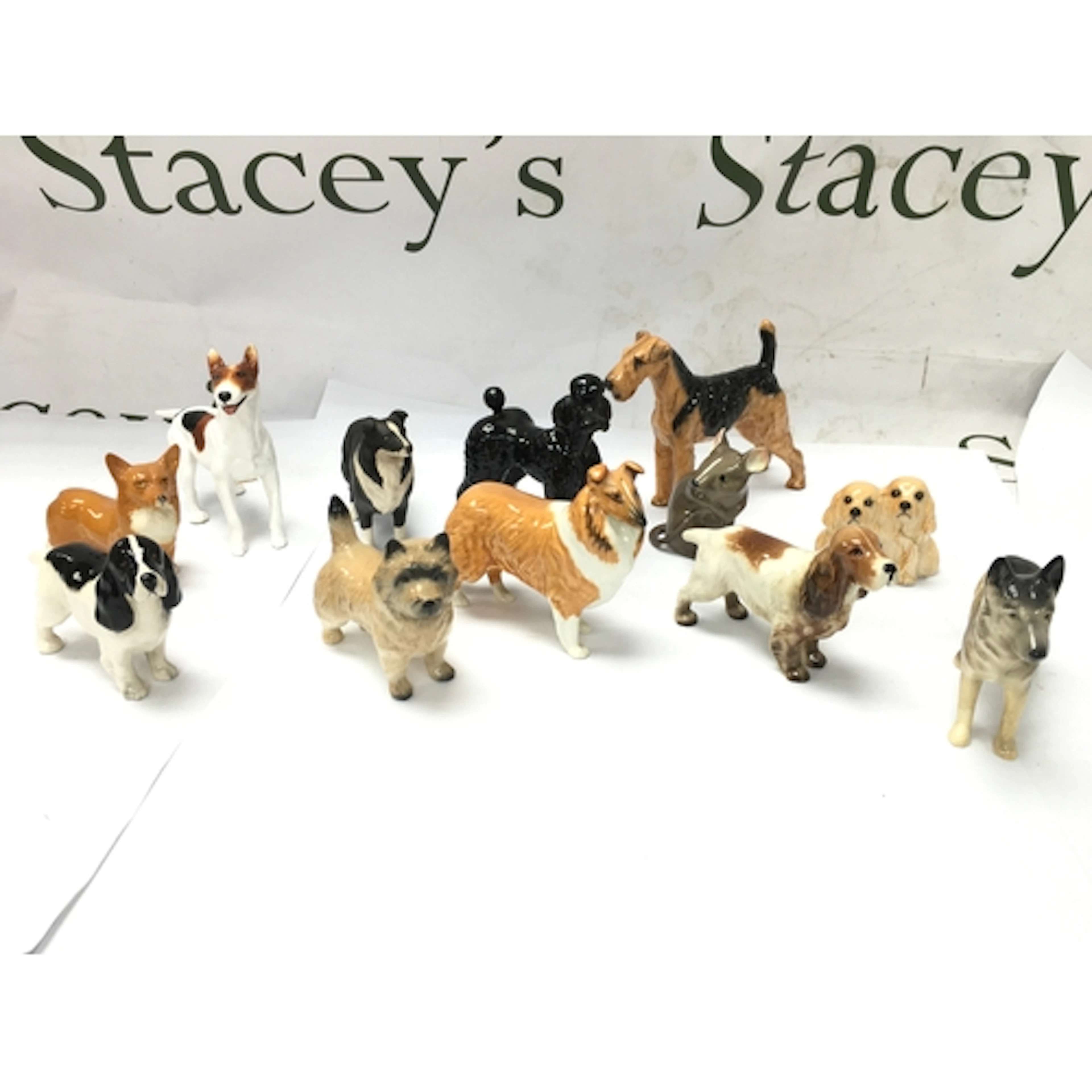 Collect of small cermaic dog figurines including beswick suc...