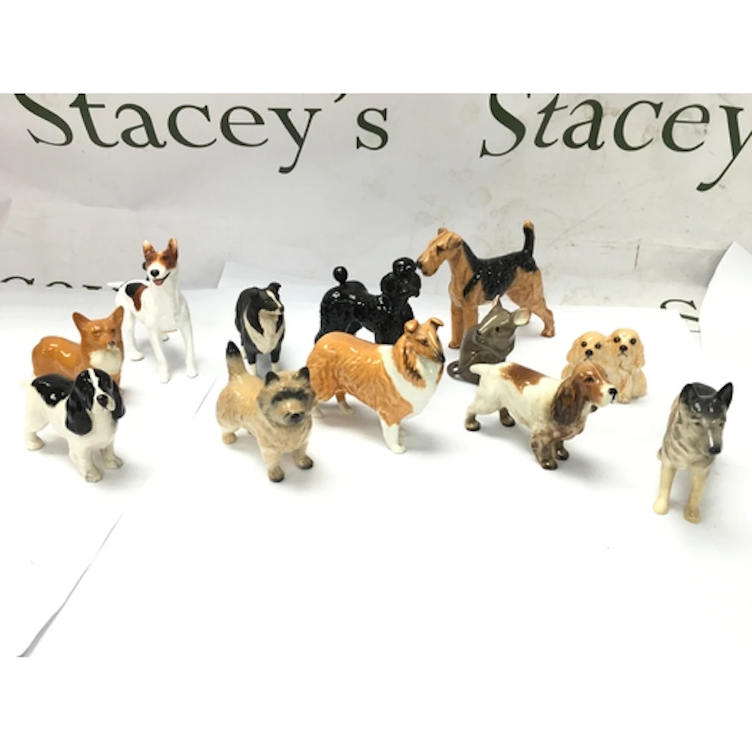 Collect of small cermaic dog figurines including beswick suc...