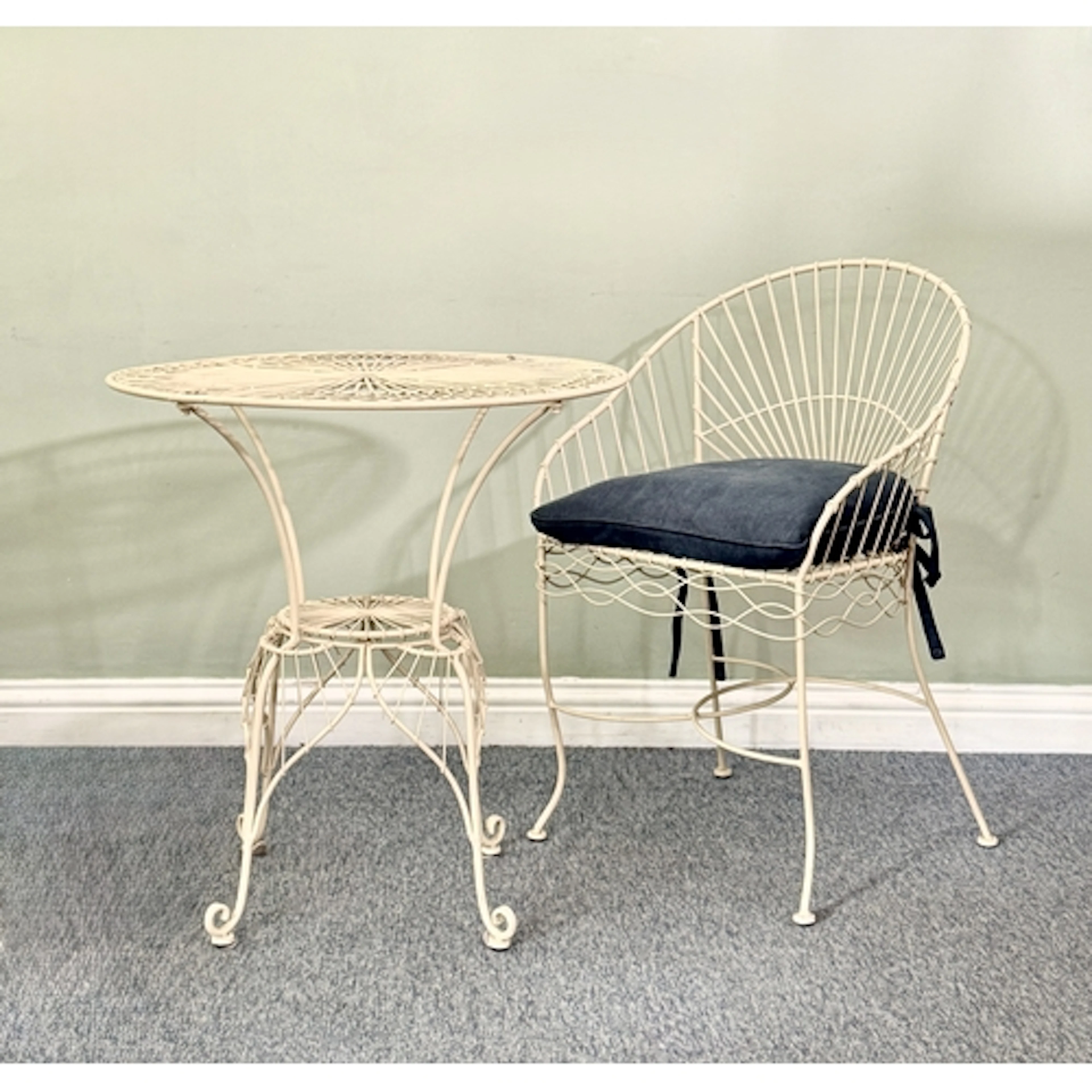 An OKA painted metal bistro-style garden or garden room tabl...