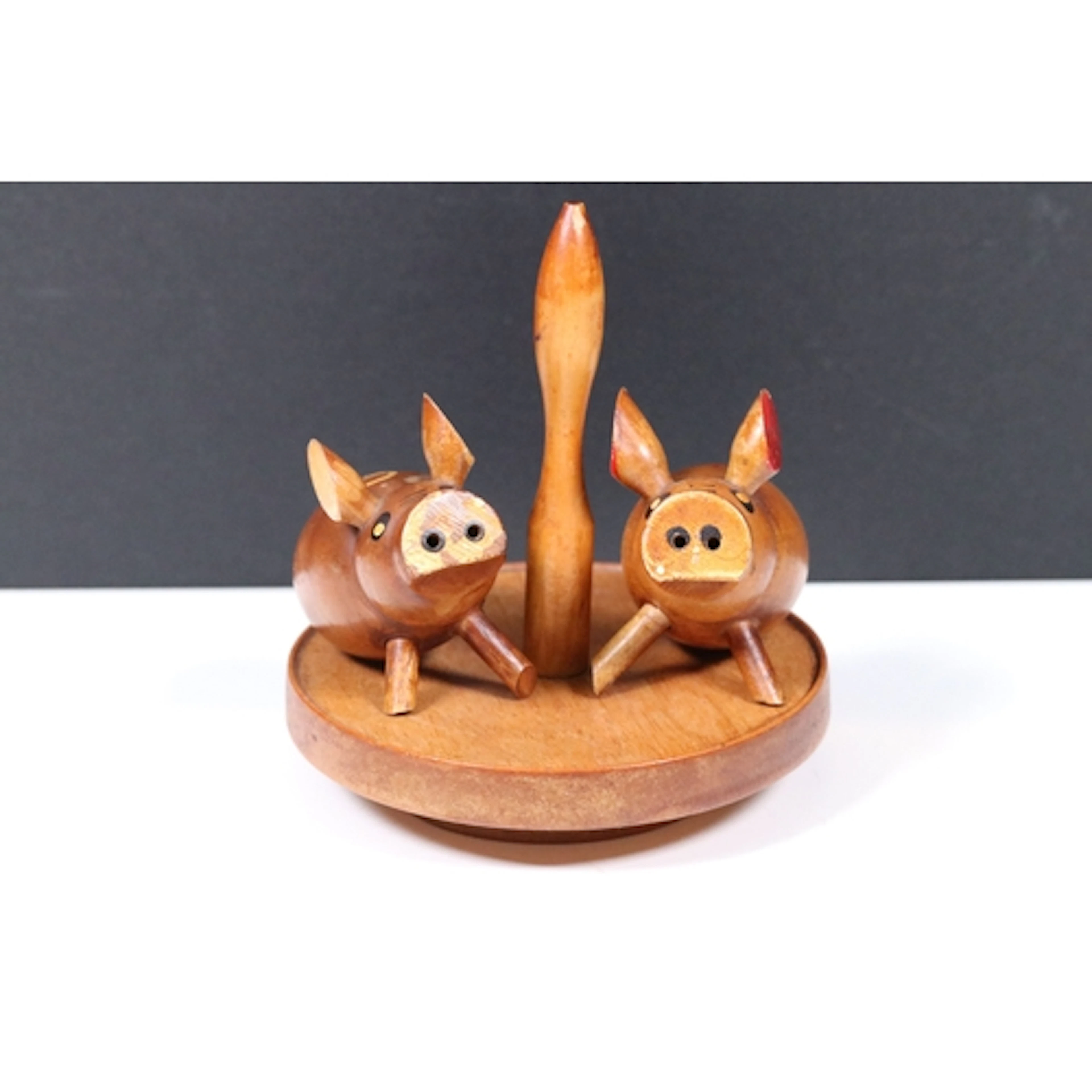 Mid-century folk art turned wooden salt and pepper pots in t...