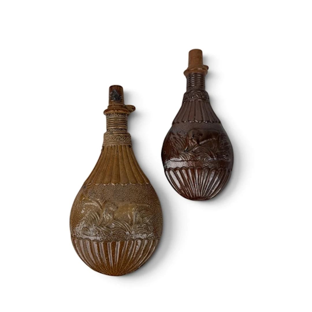 TWO STEPHEN GREEN SALT-GLAZED STONEWARE SPIRIT FLASKS, LAMBE...