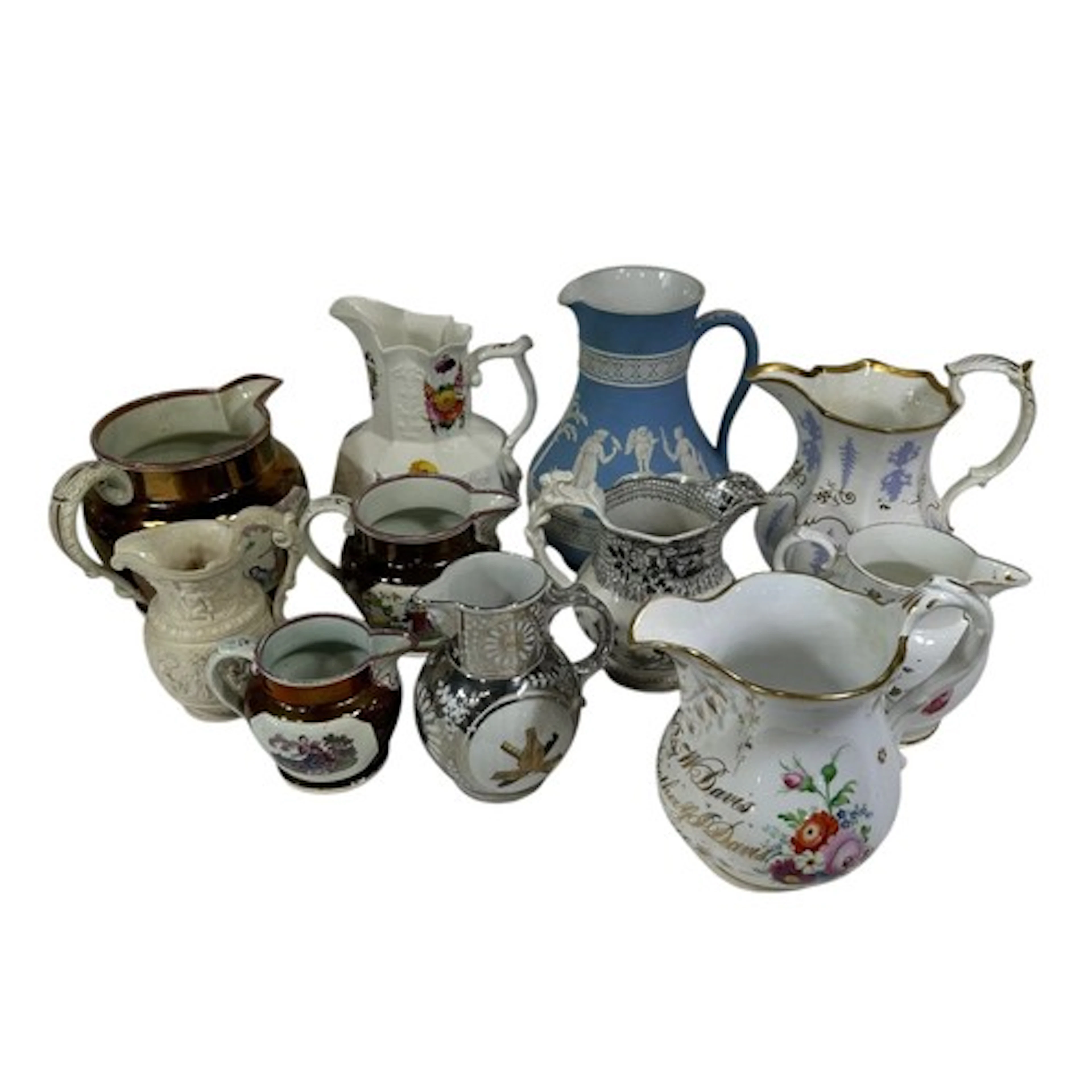 A collection of eleven 19th century ceramic jugs including c...