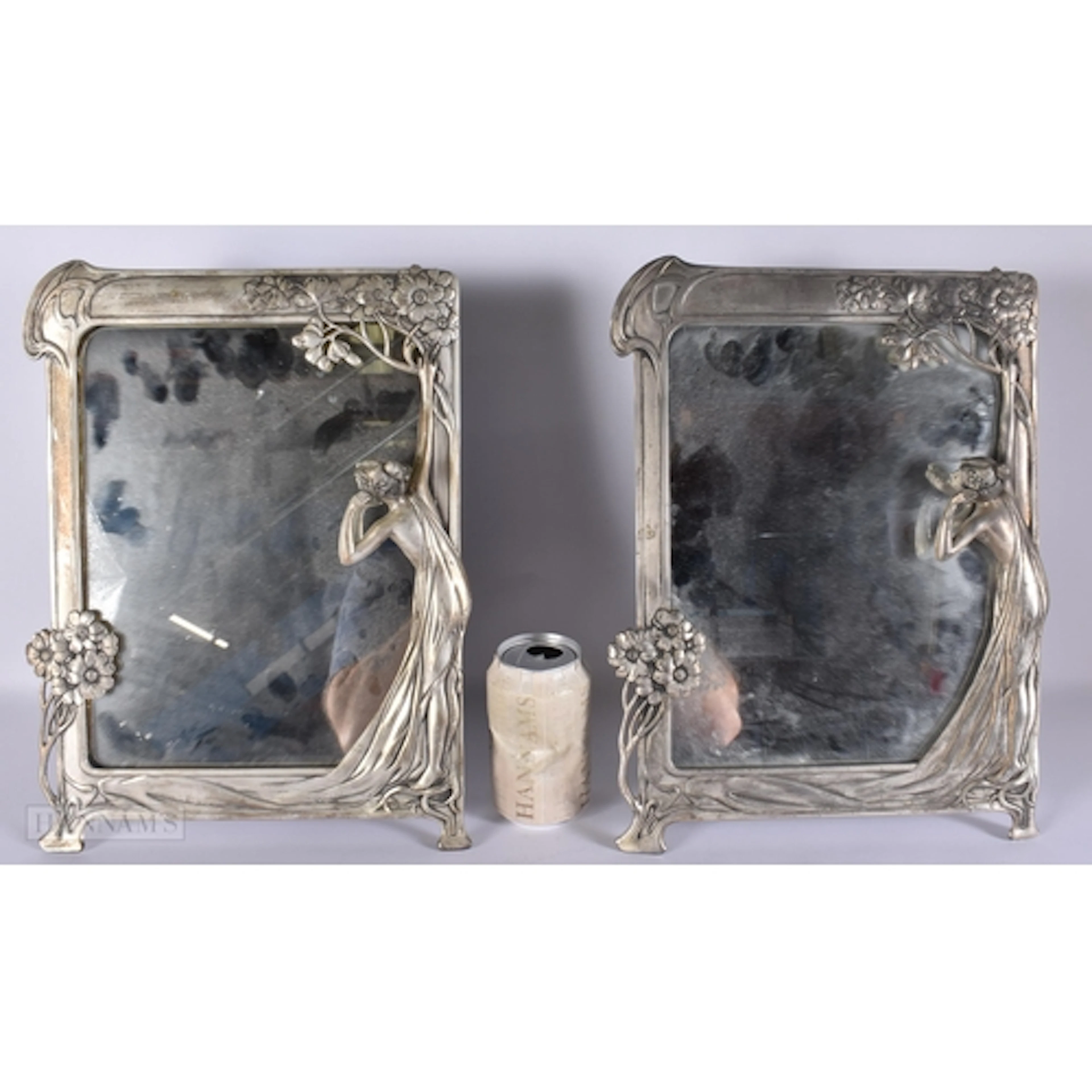 A PAIR OF ART NOUVEAU DESIGN MAIDEN PHOTOGRAPH FRAMES. 38 cm...